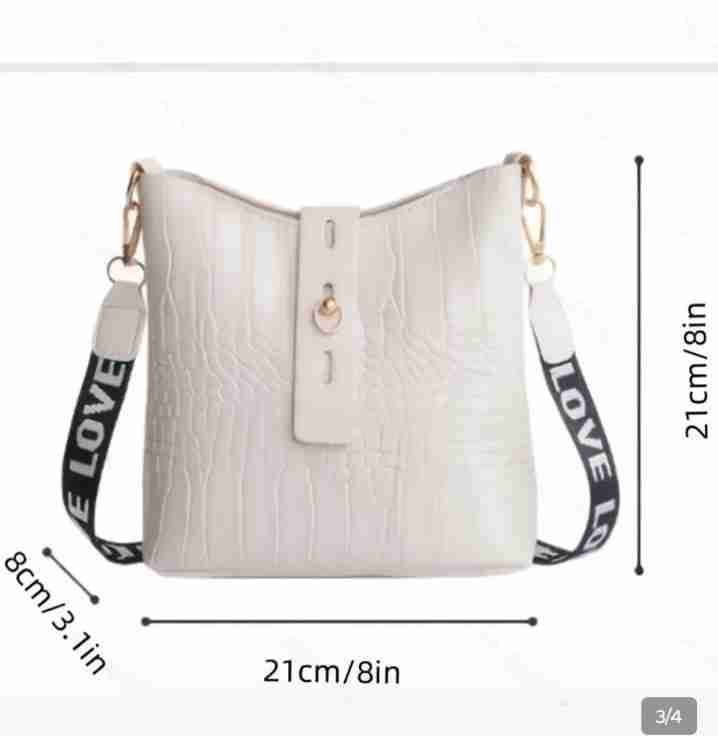 Bolso blanco con correa estampada