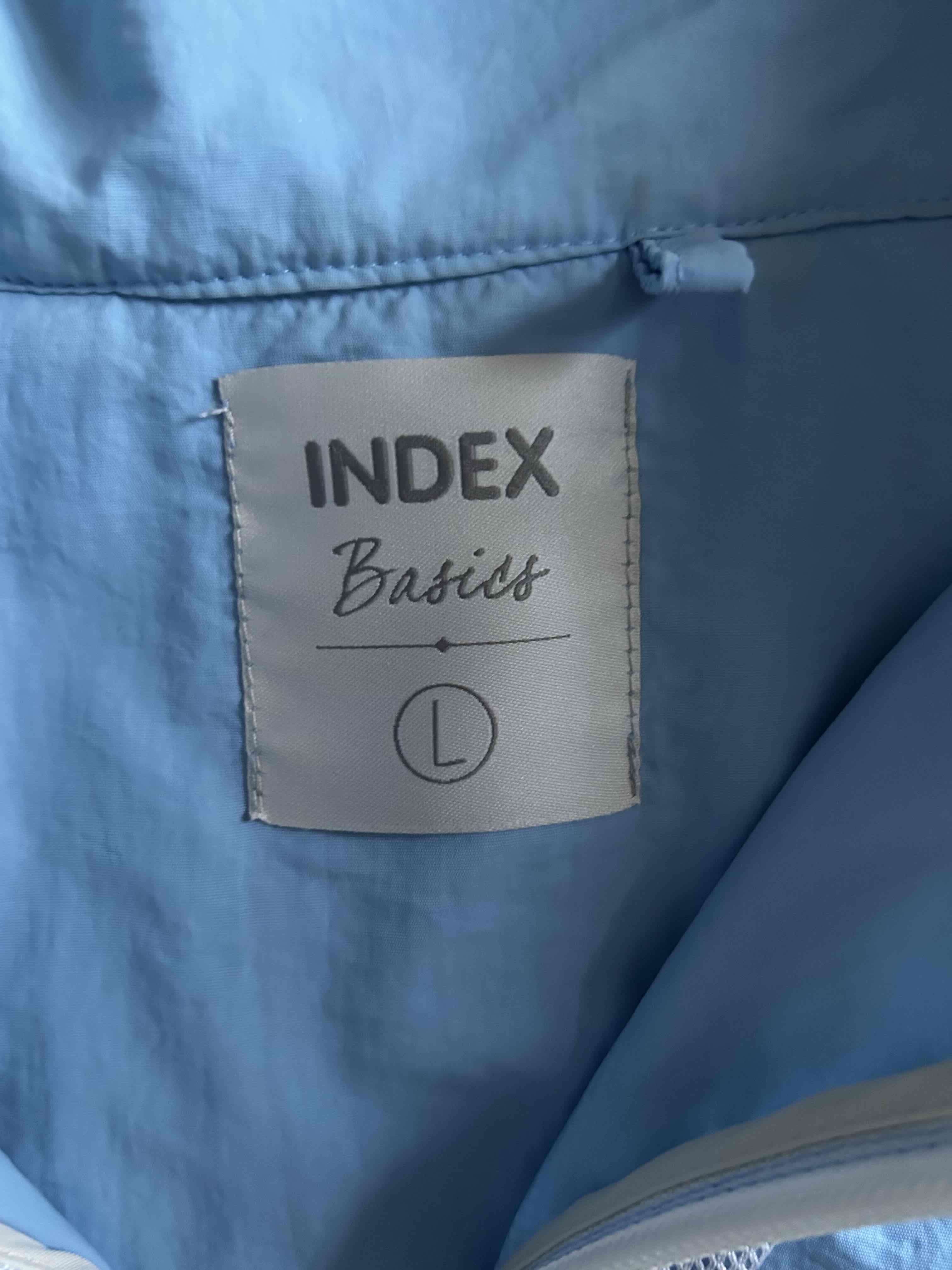 cortavientos azul cielo y beige Index - miniatura 2