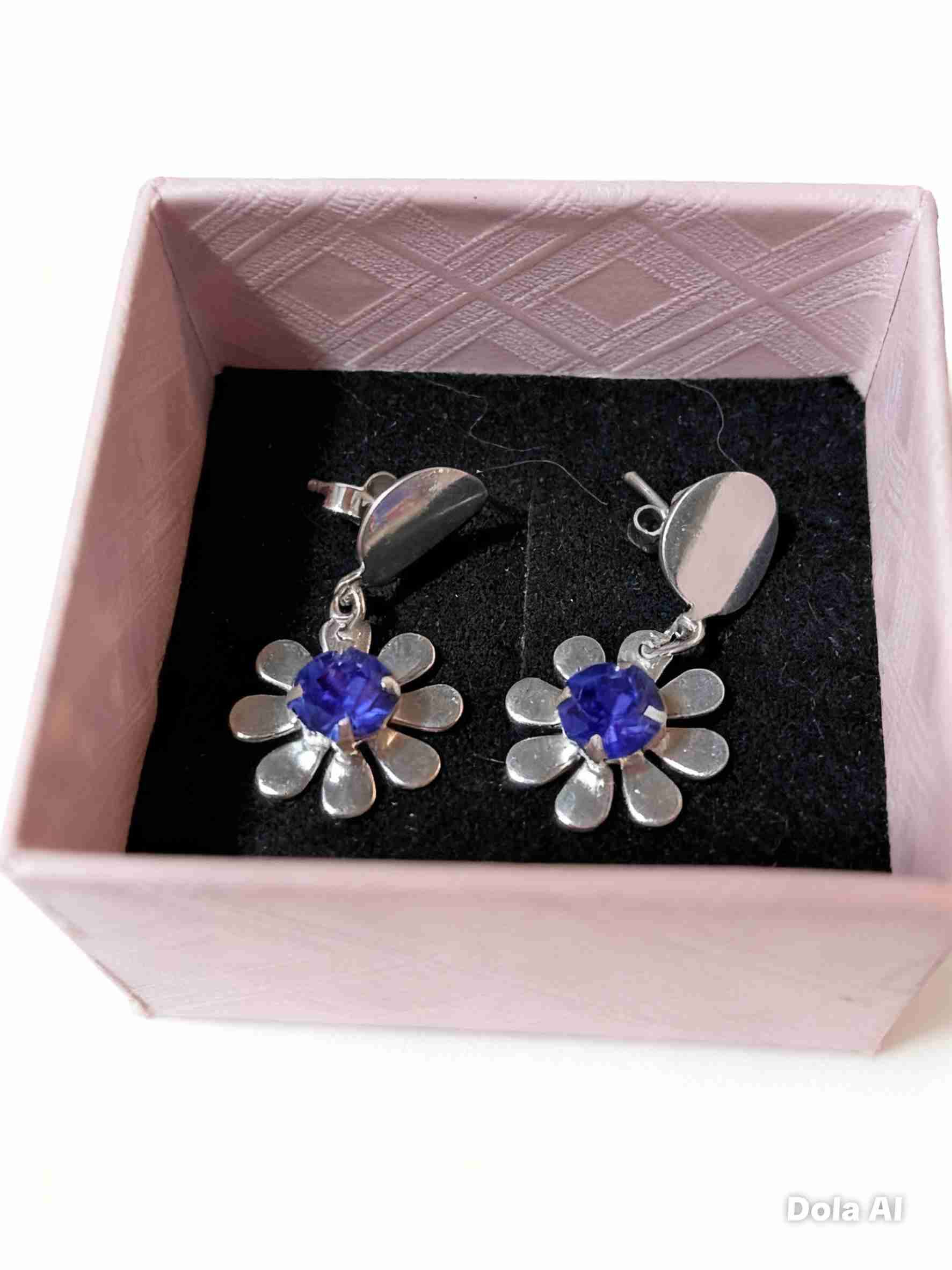 Aros flor con piedra azul