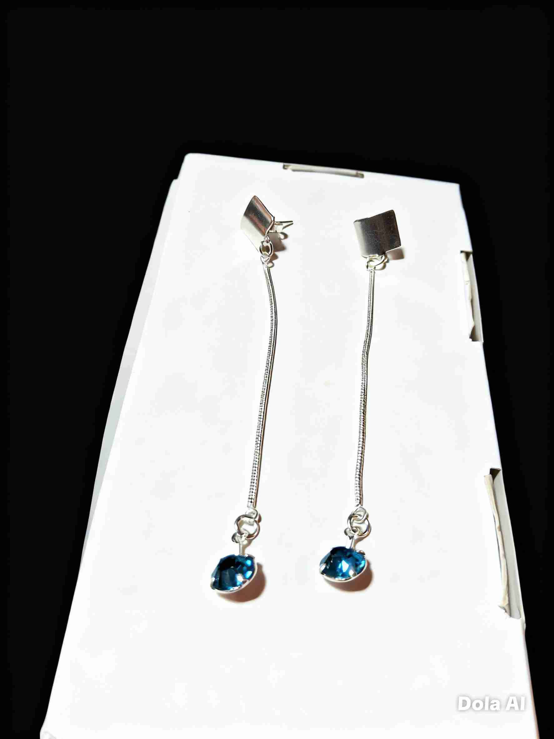 Aros flor con piedra azul - miniatura 3