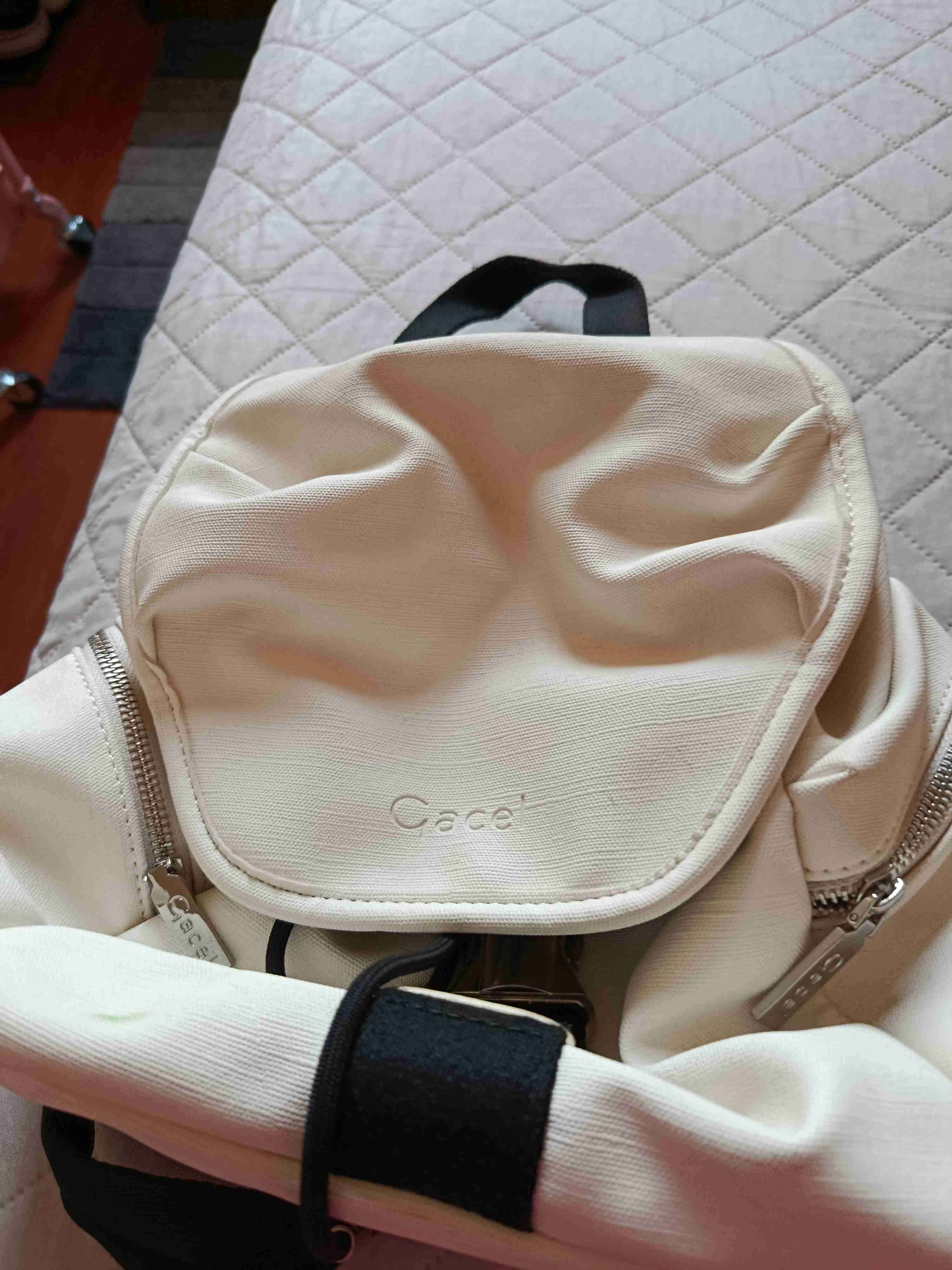 Mochila blanca con cierre