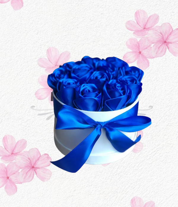 Caja de rosas azules artificiales