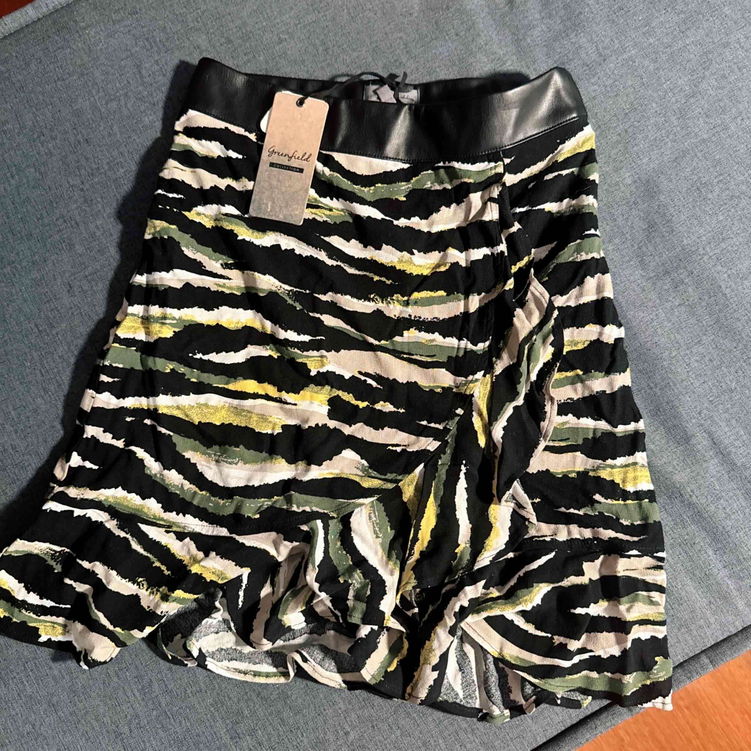 Falda corta estampado animal greenfield collection