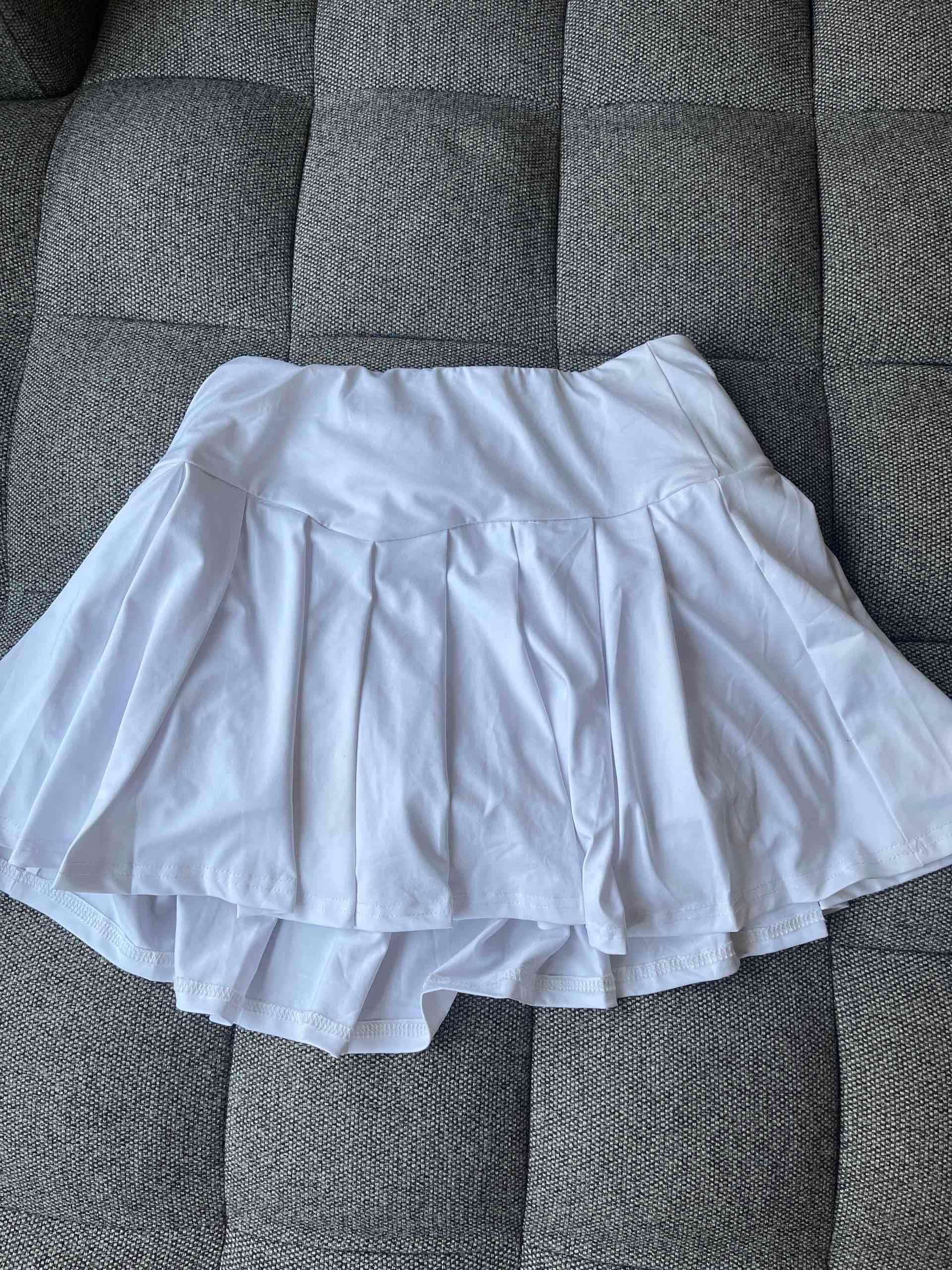 Mini falda blanca plisada