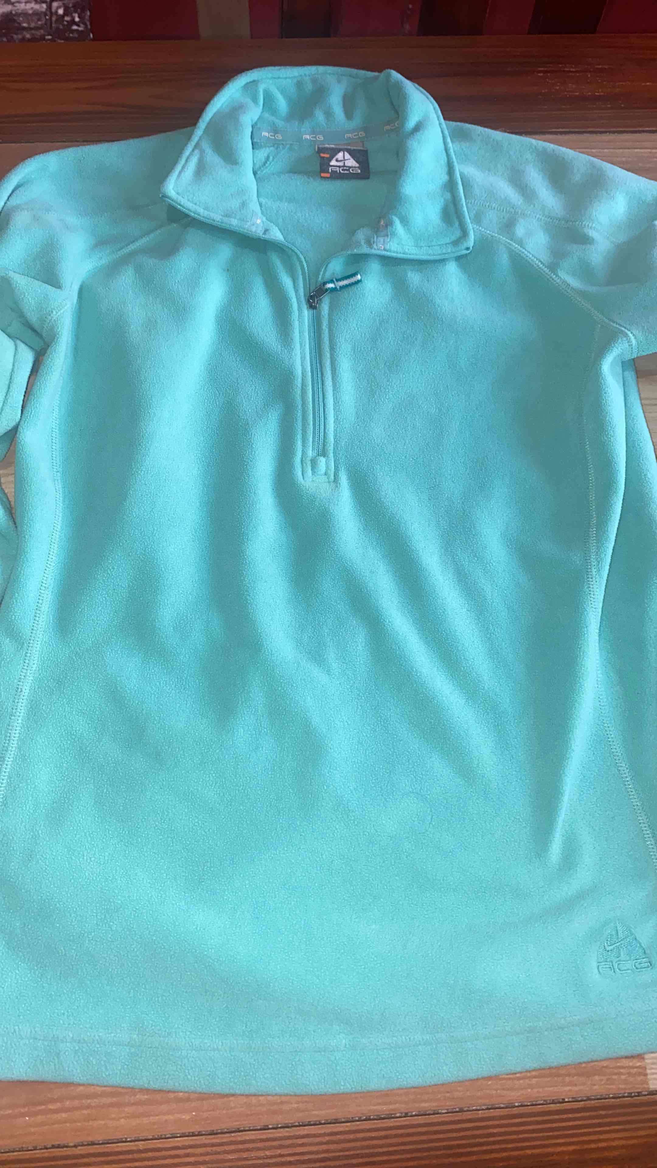 Polerón turquesa ACG de mujer