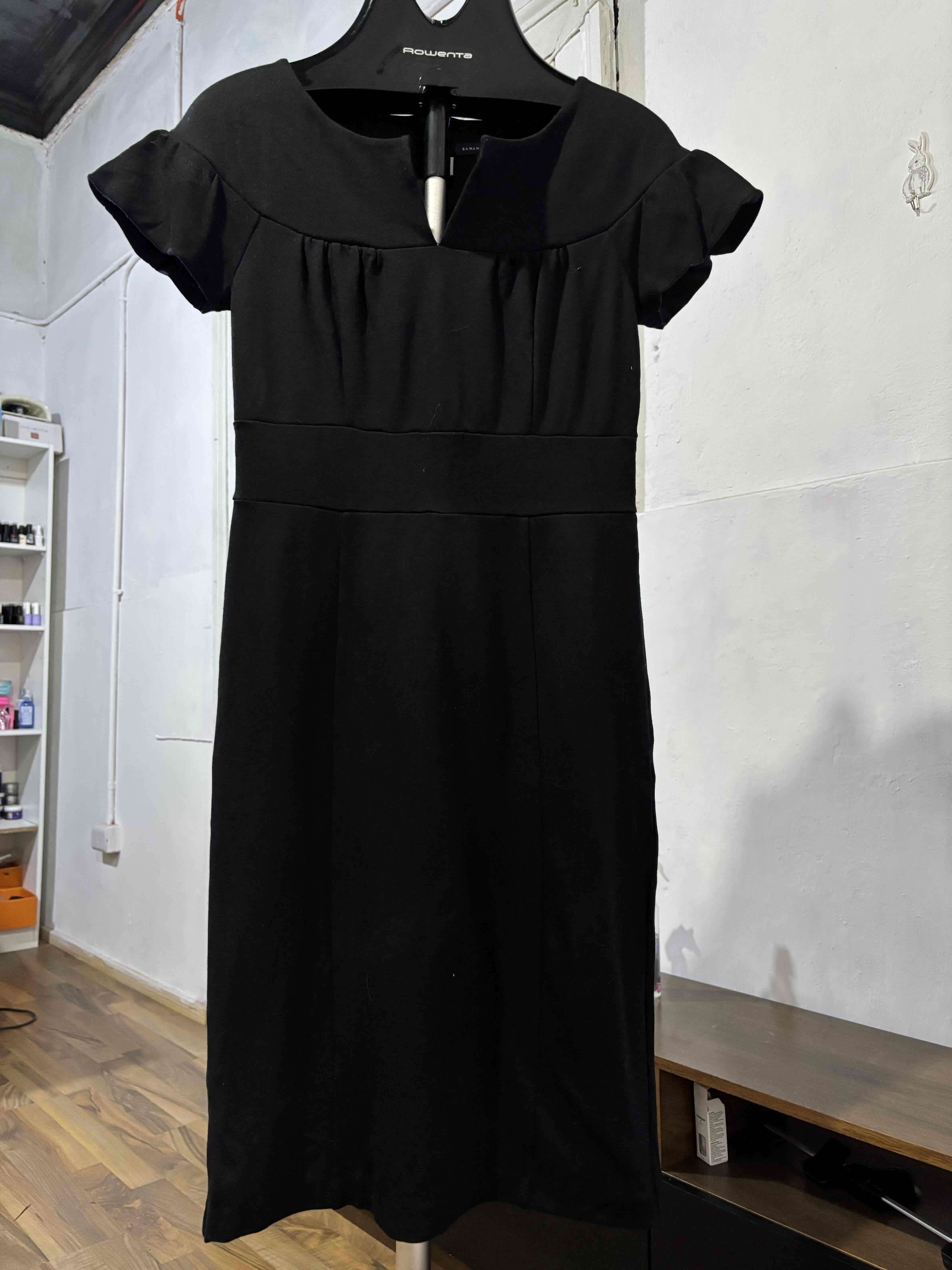 Vestido negro elegante - miniatura 2
