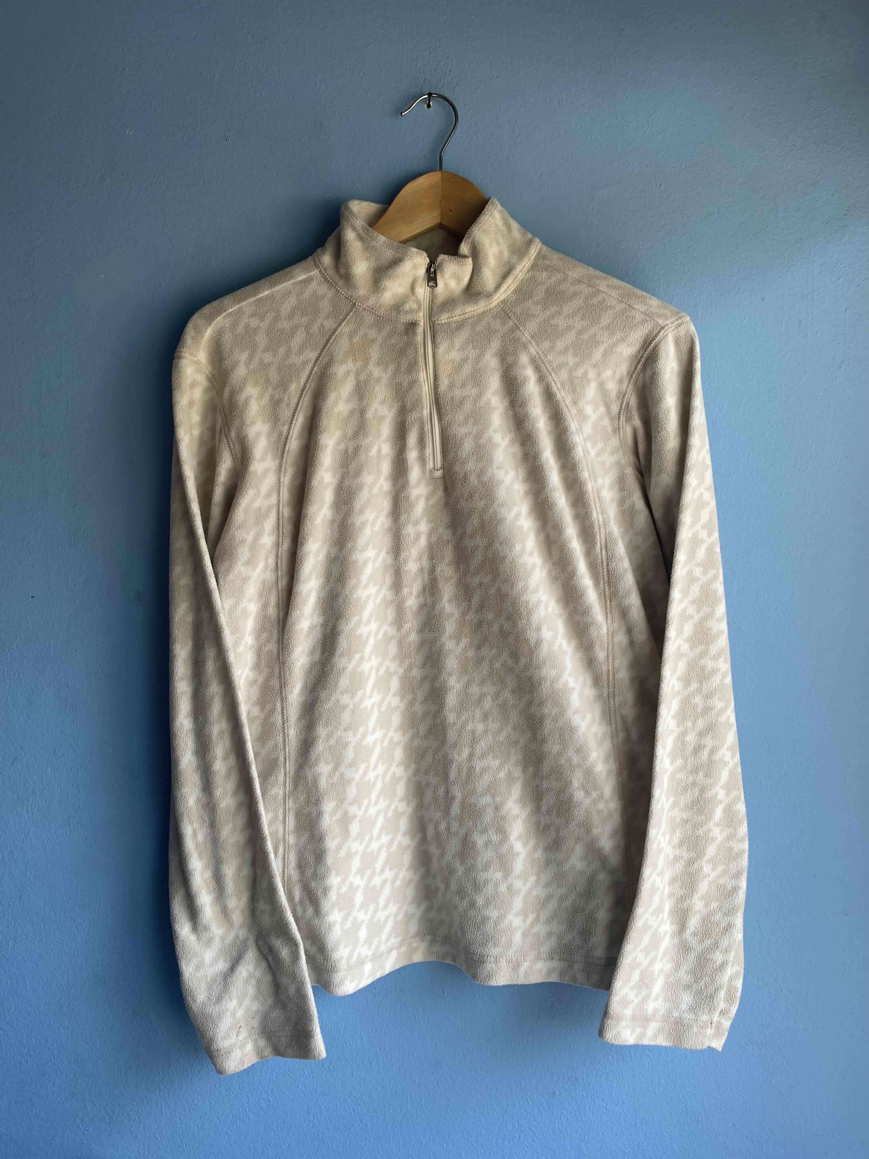 Polerón beige con diseño Columbia