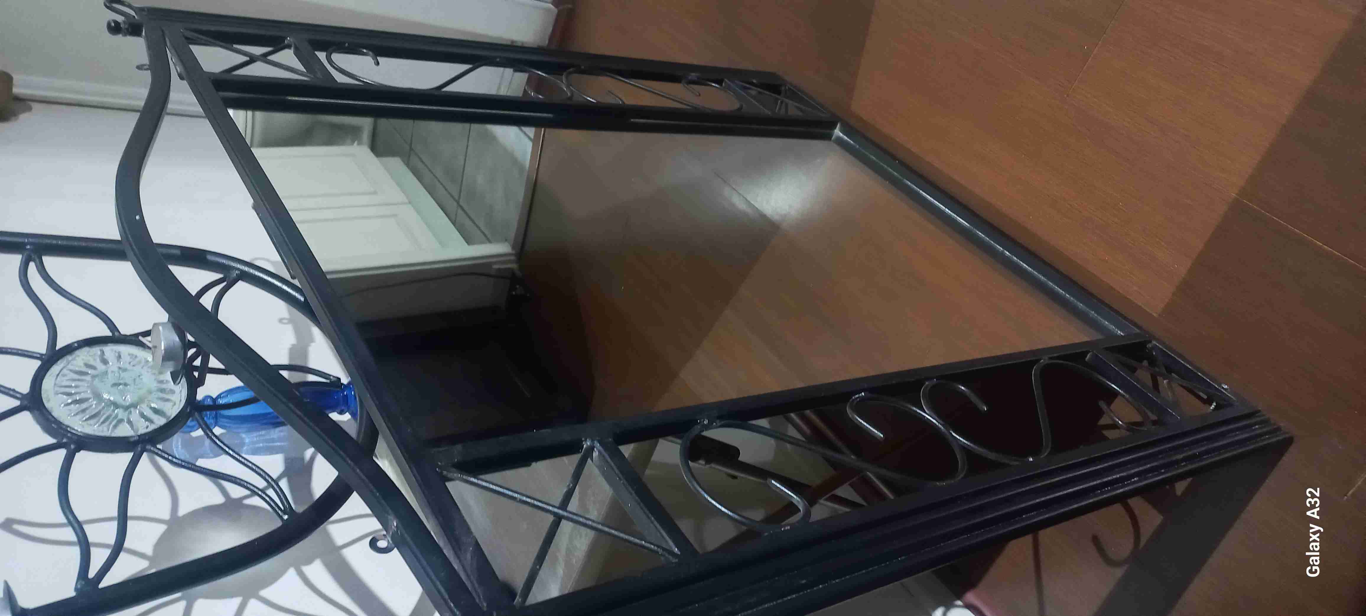 Espejo decorativo con marco de hierro