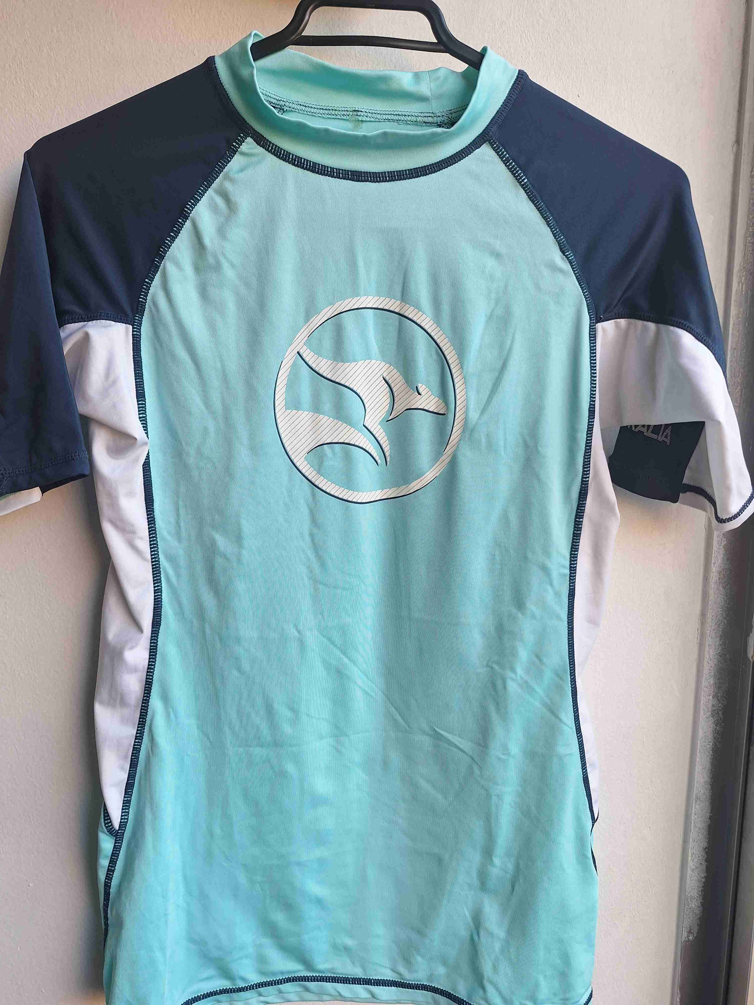 Polera deportiva verde agua