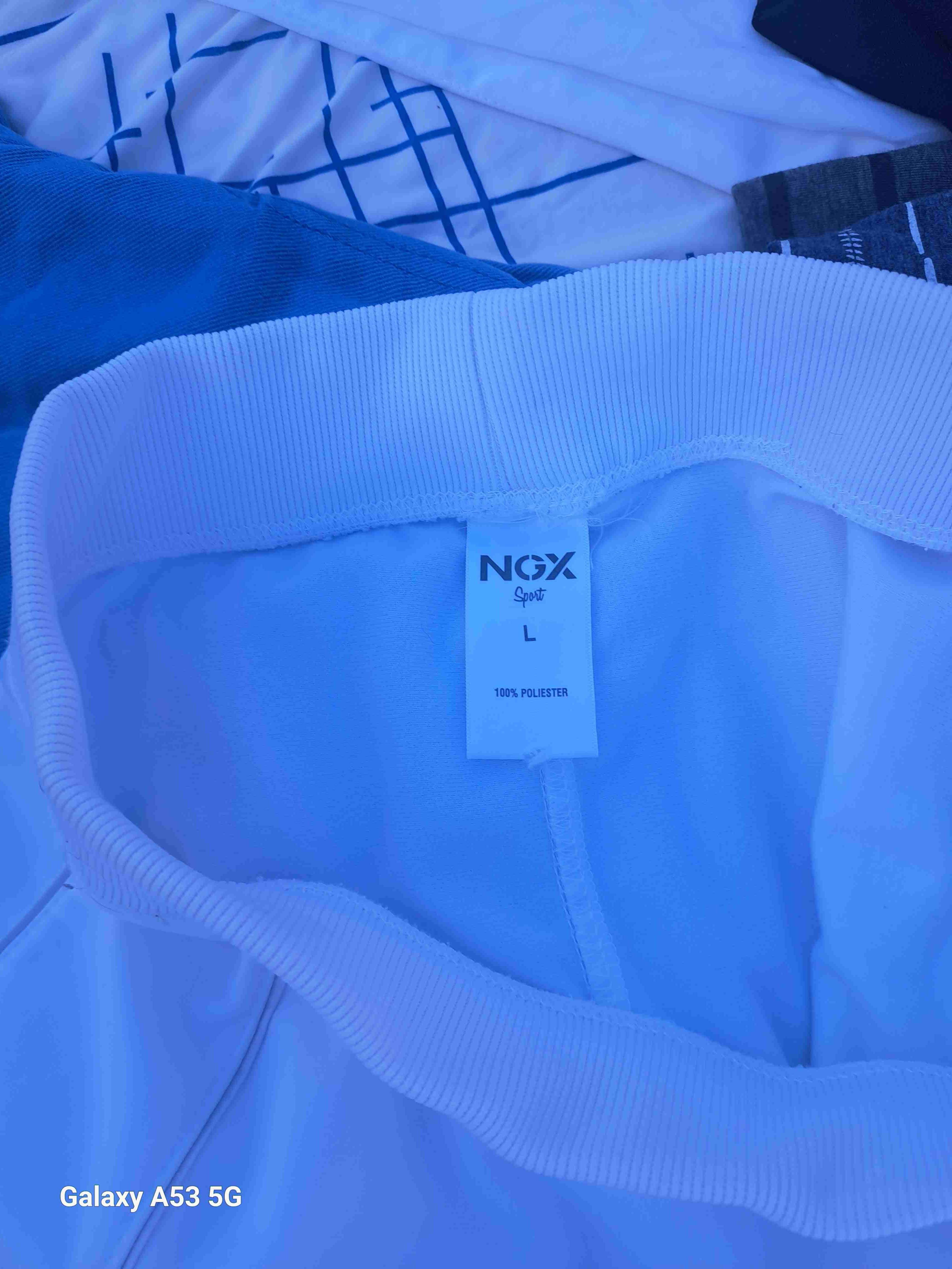 Pantalones deportivos blancos - miniatura 3