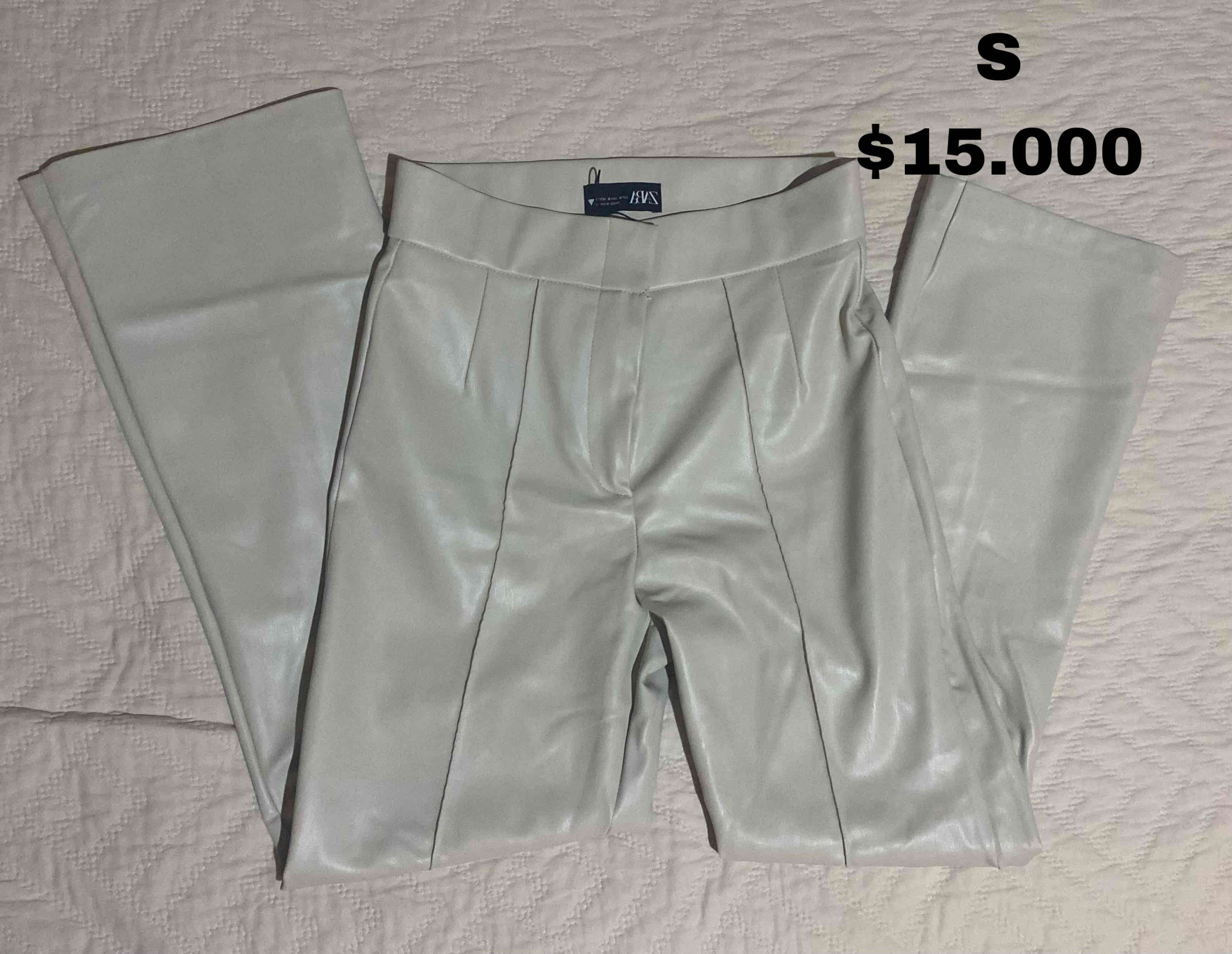 Pantalones Zara gris de ecocuero