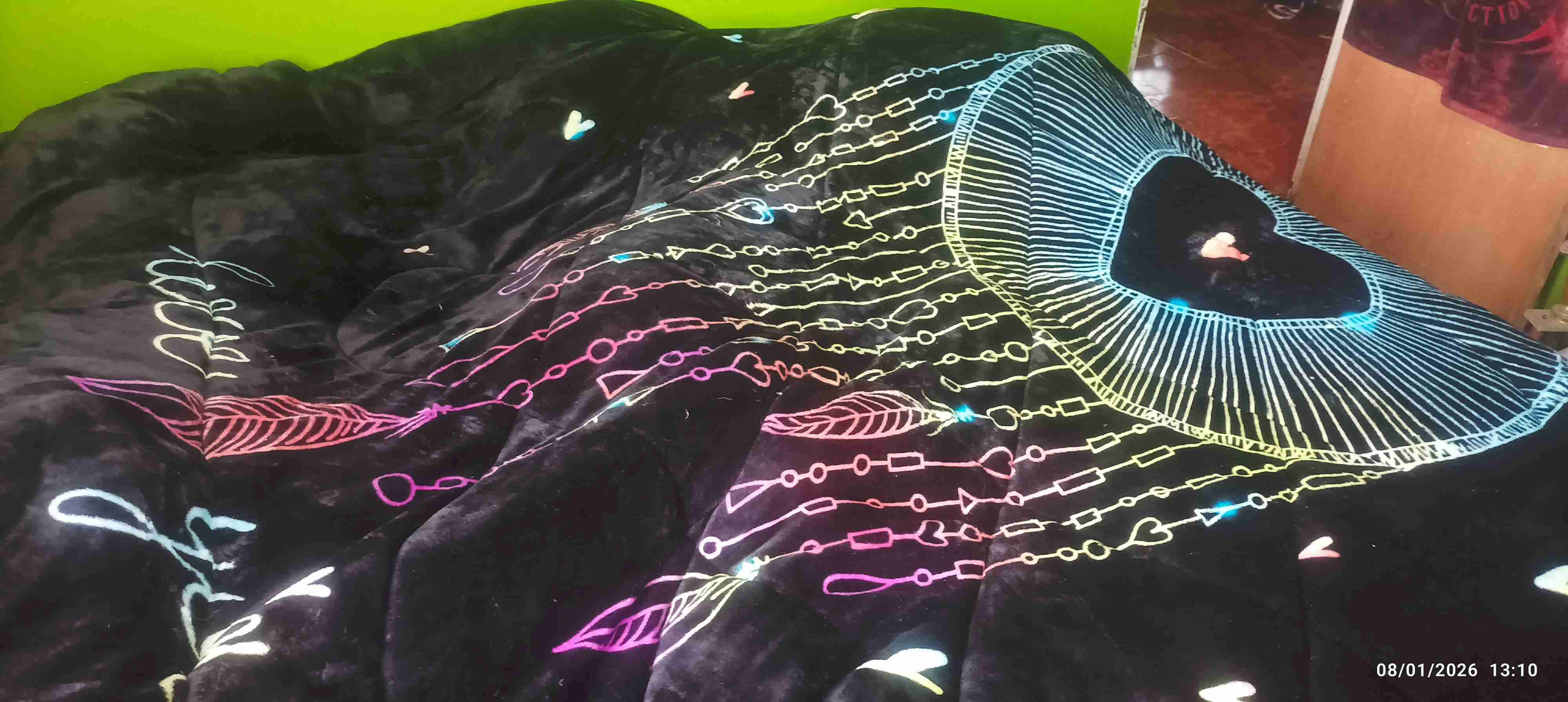 Cobertor negro con diseño colorido - 1