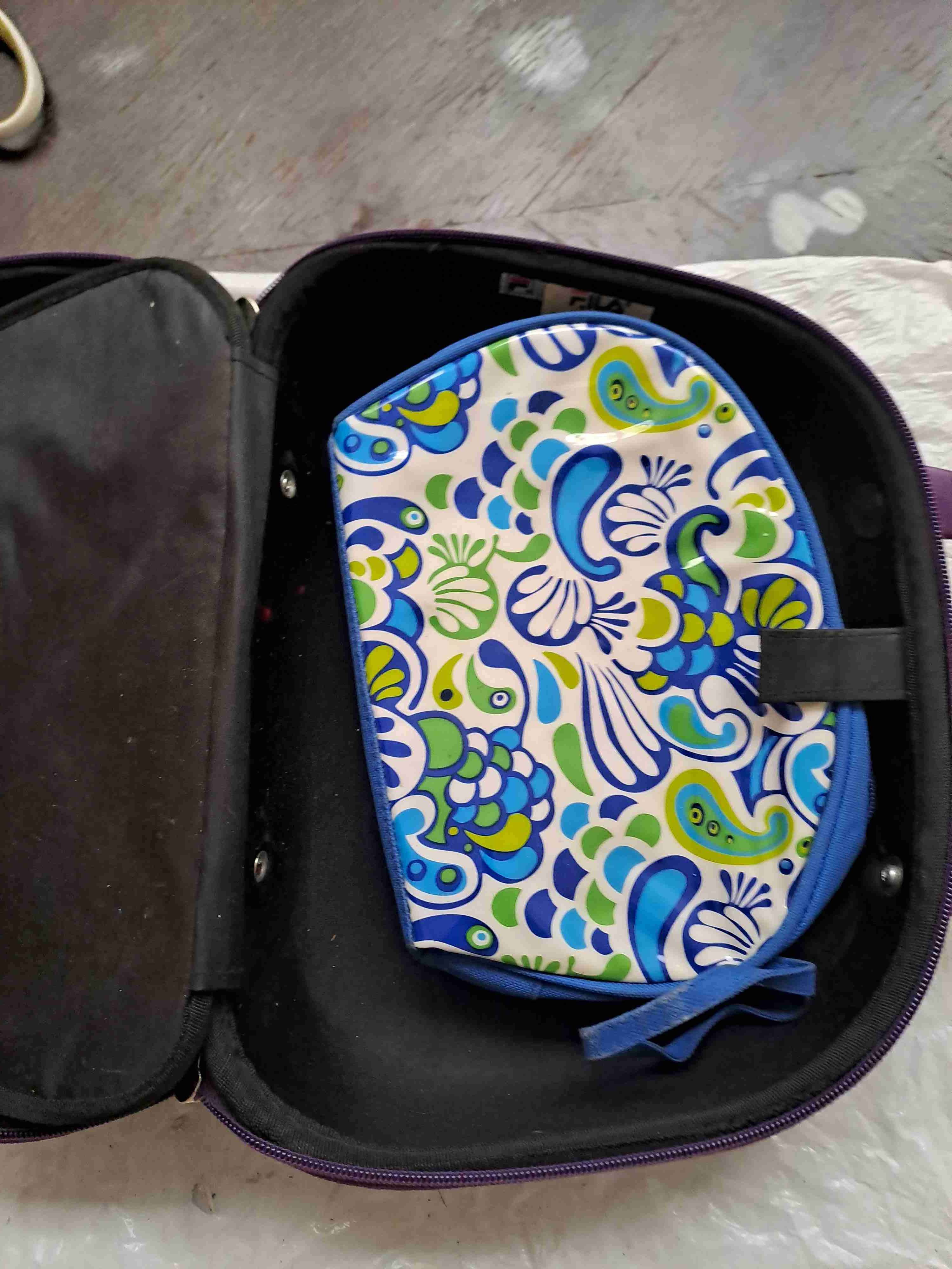 Bolso morado circular elegante - miniatura 4