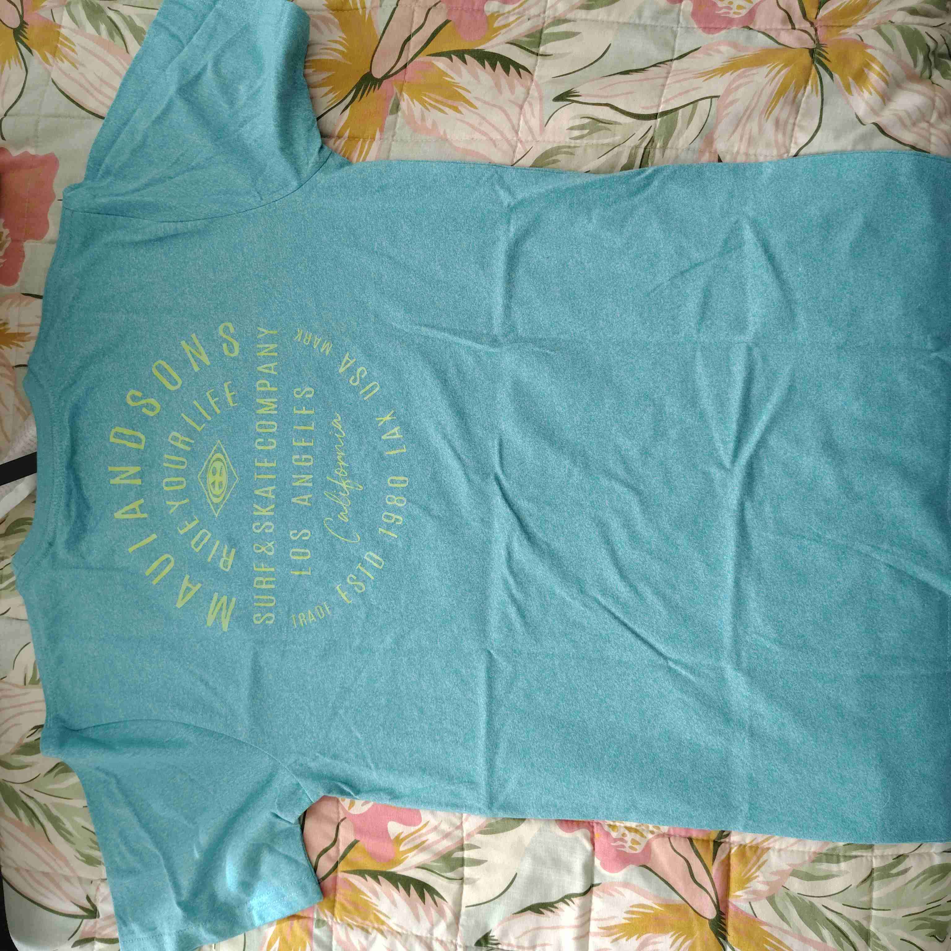 Polera azul con etiqueta - miniatura 3