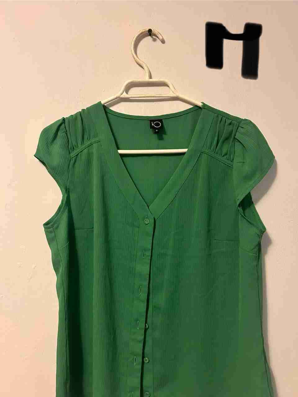 Blusa verde sin mangas