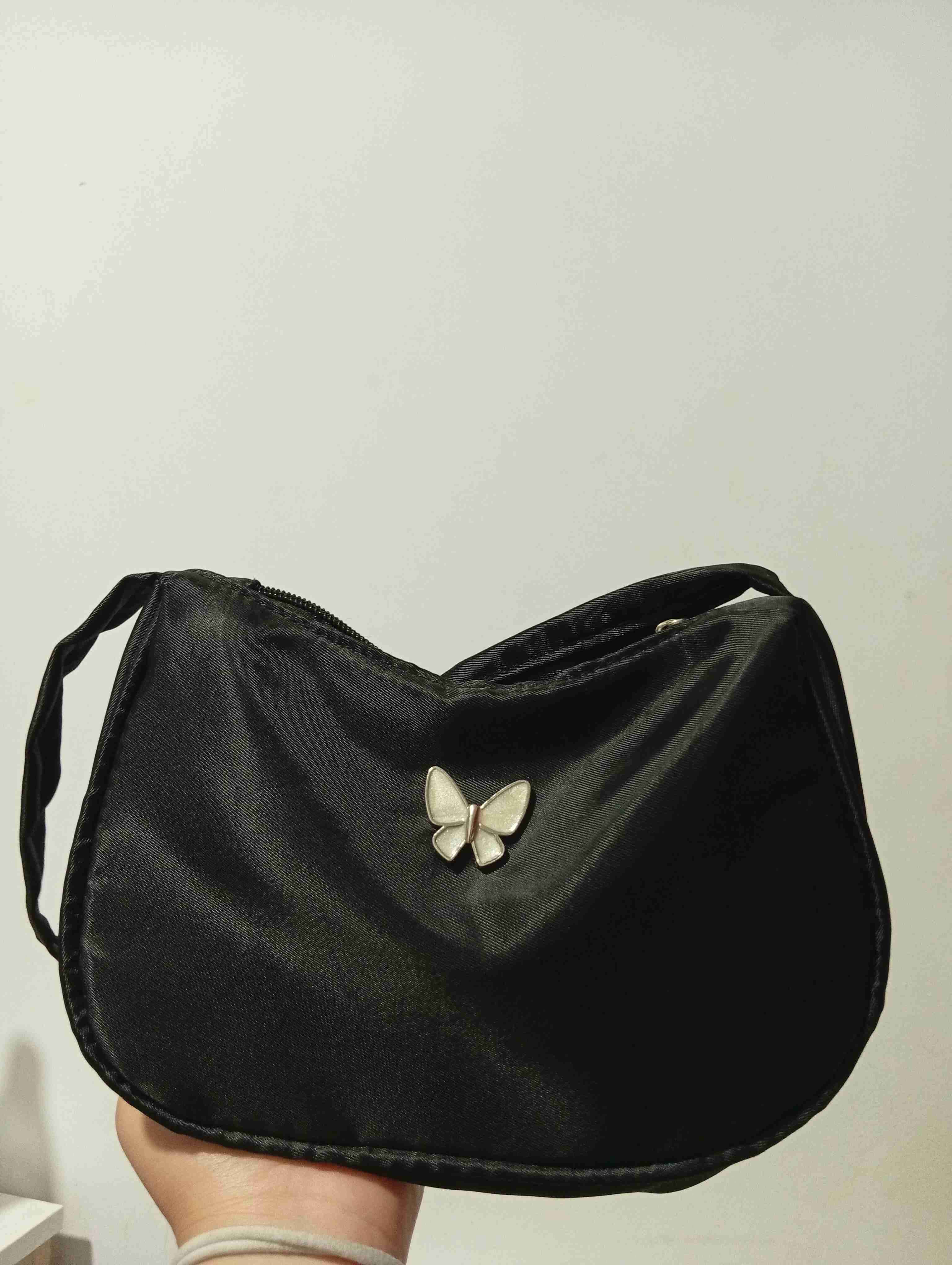 Cartera negra con detalle de mariposa - 2