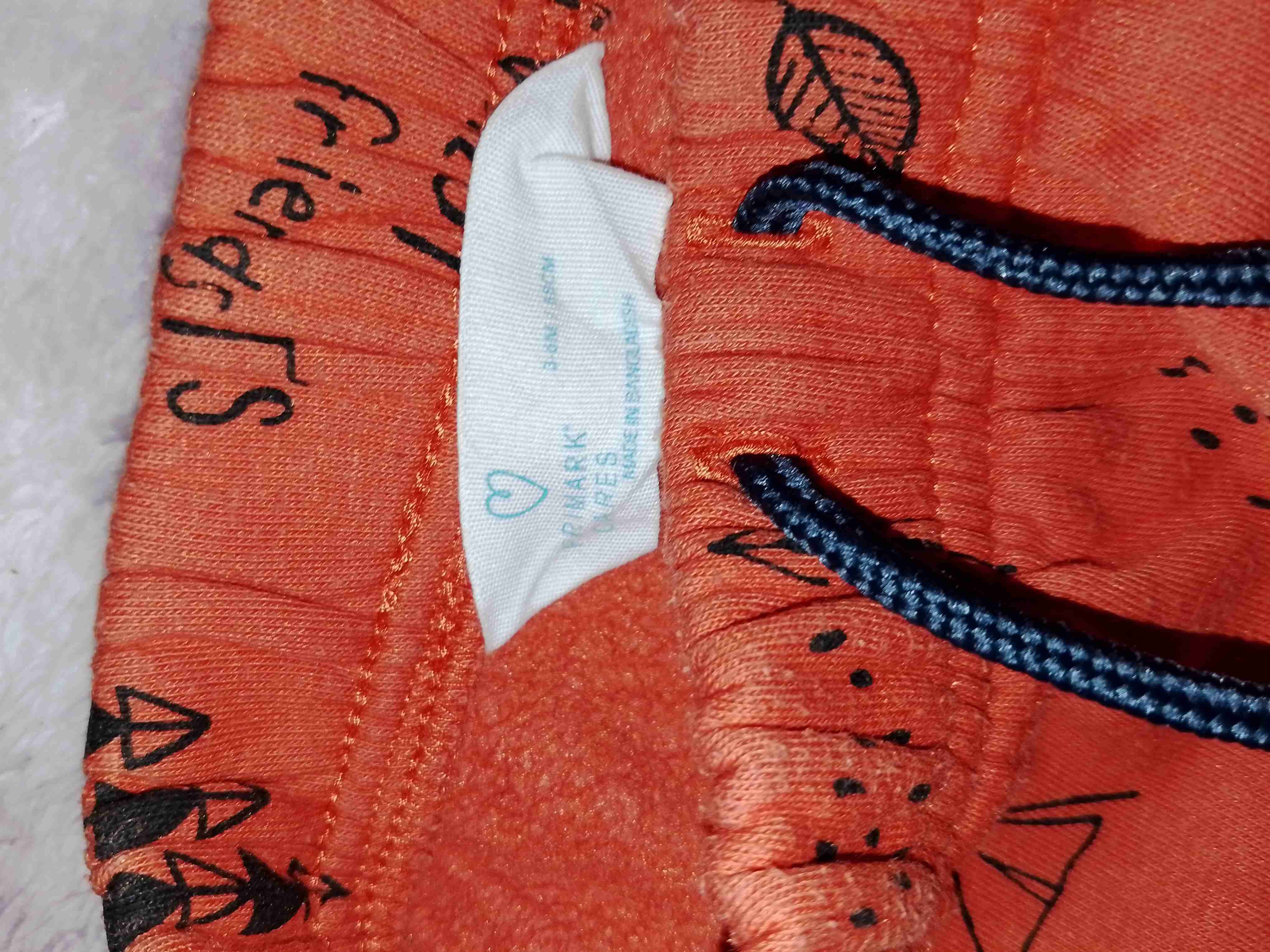 Pantalones infantiles naranjos estampados - miniatura 3