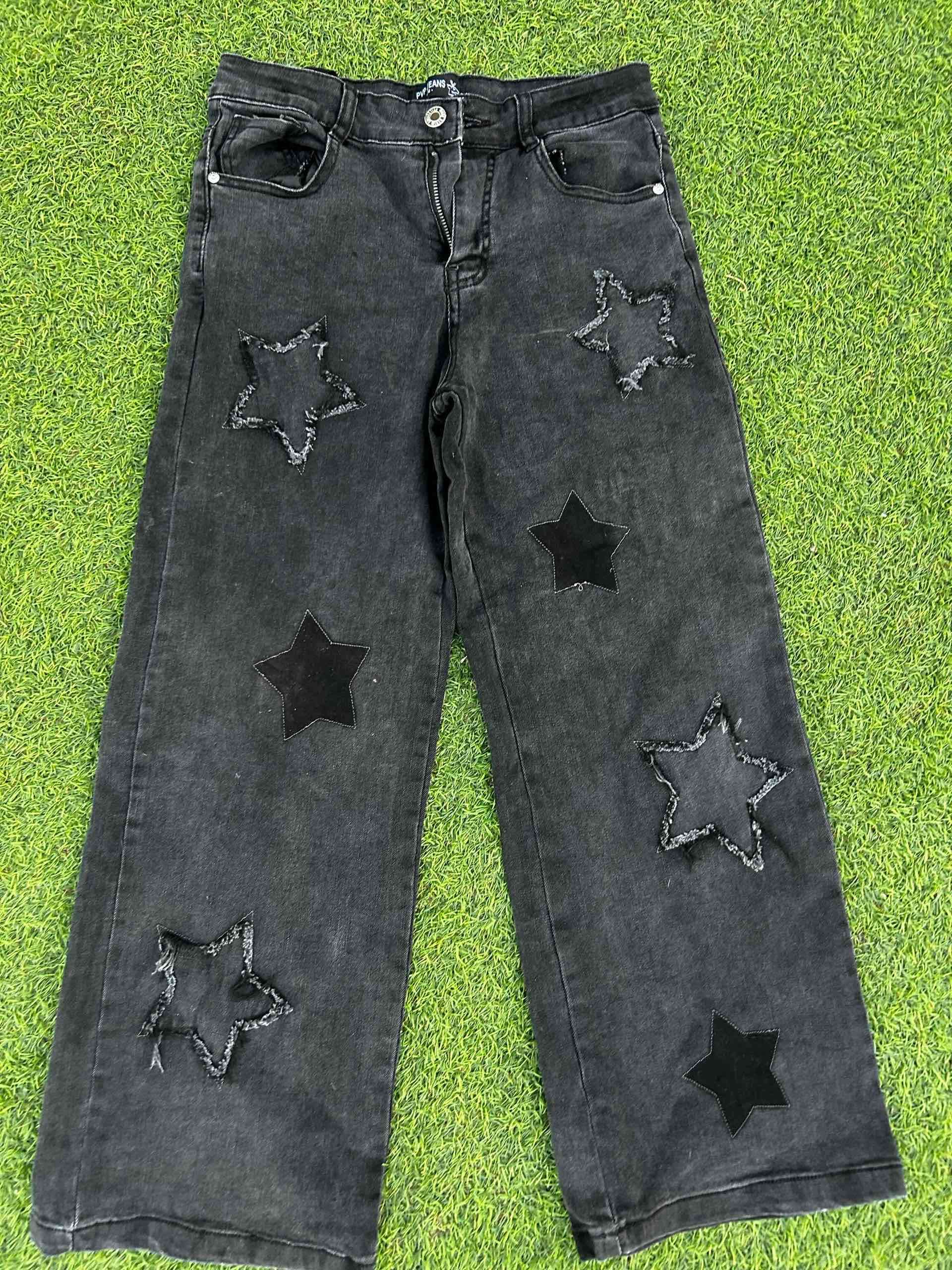 Jeans negros con estrellas - miniatura 1
