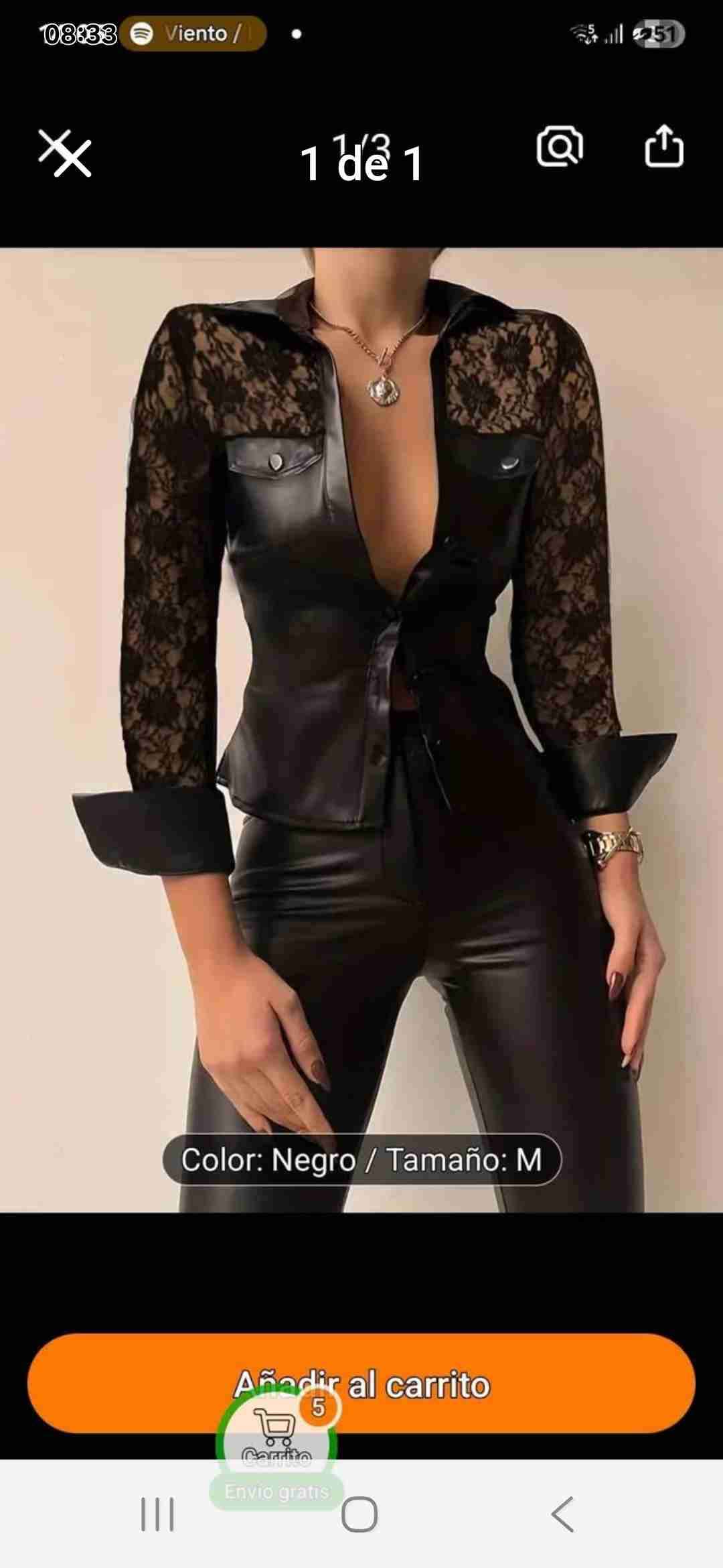 Blusa negra de encaje y cuero sintético