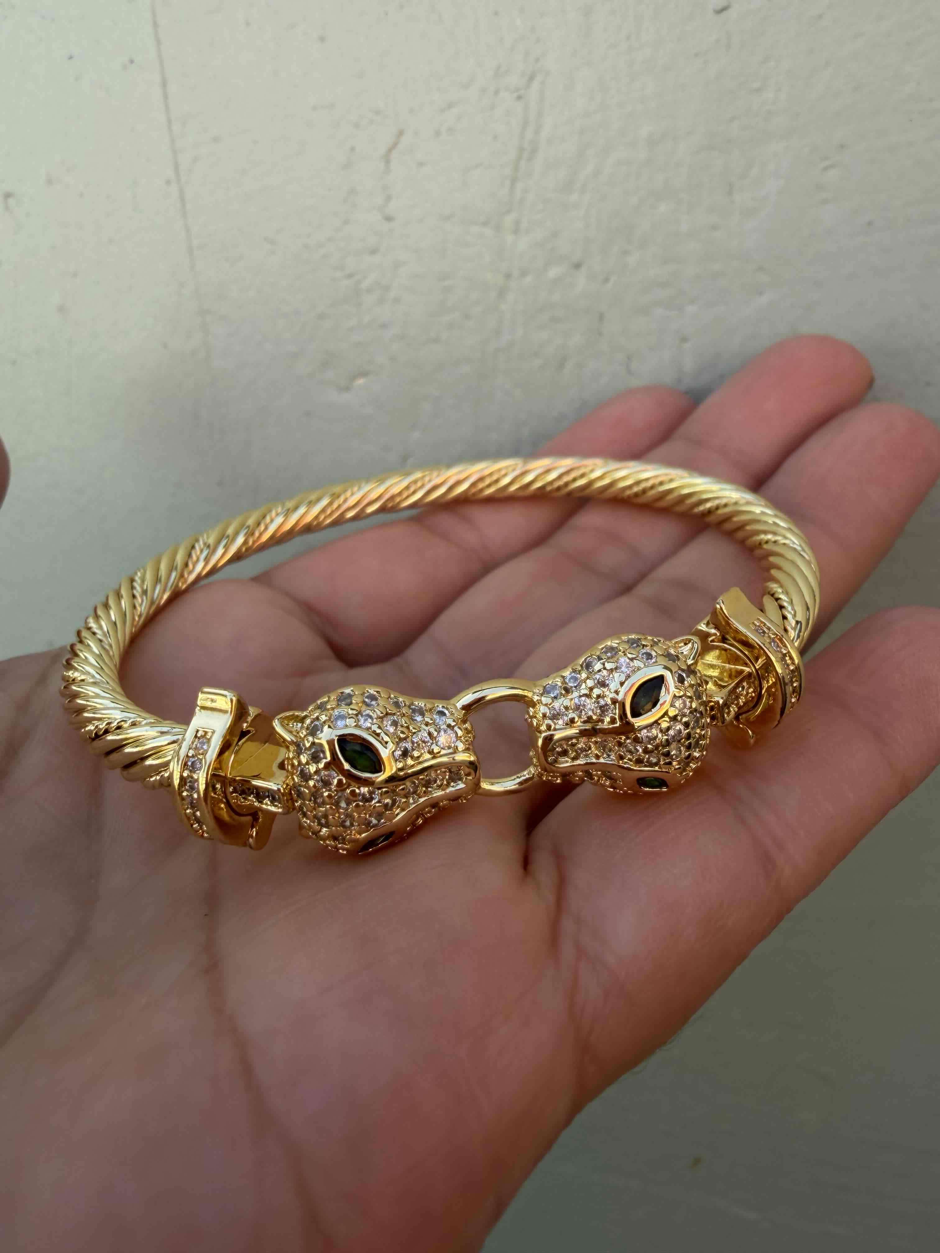 Brazalete dorado con cabezas de leopardo - miniatura 1