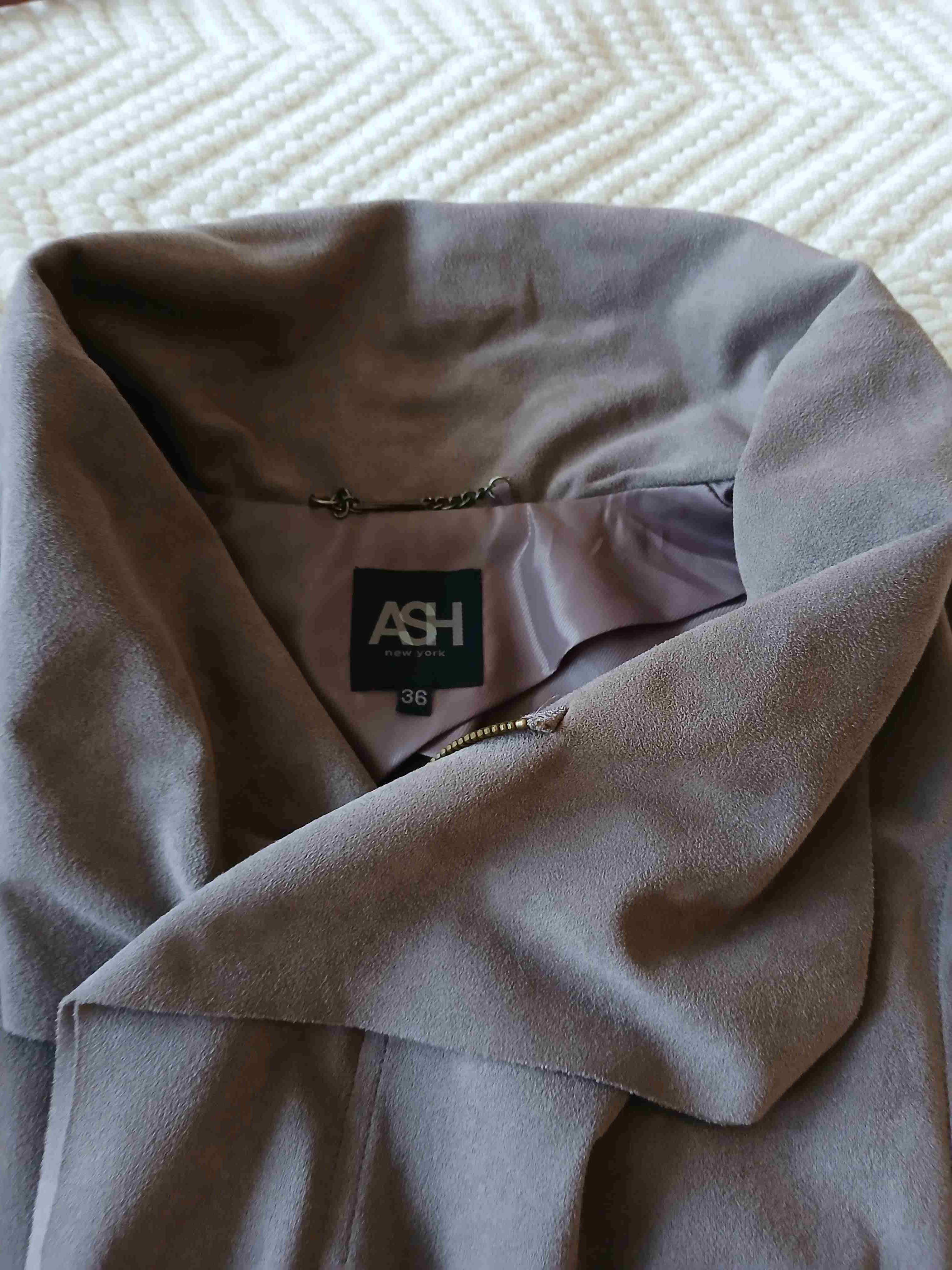 Chaleco gris sin mangas - miniatura 2