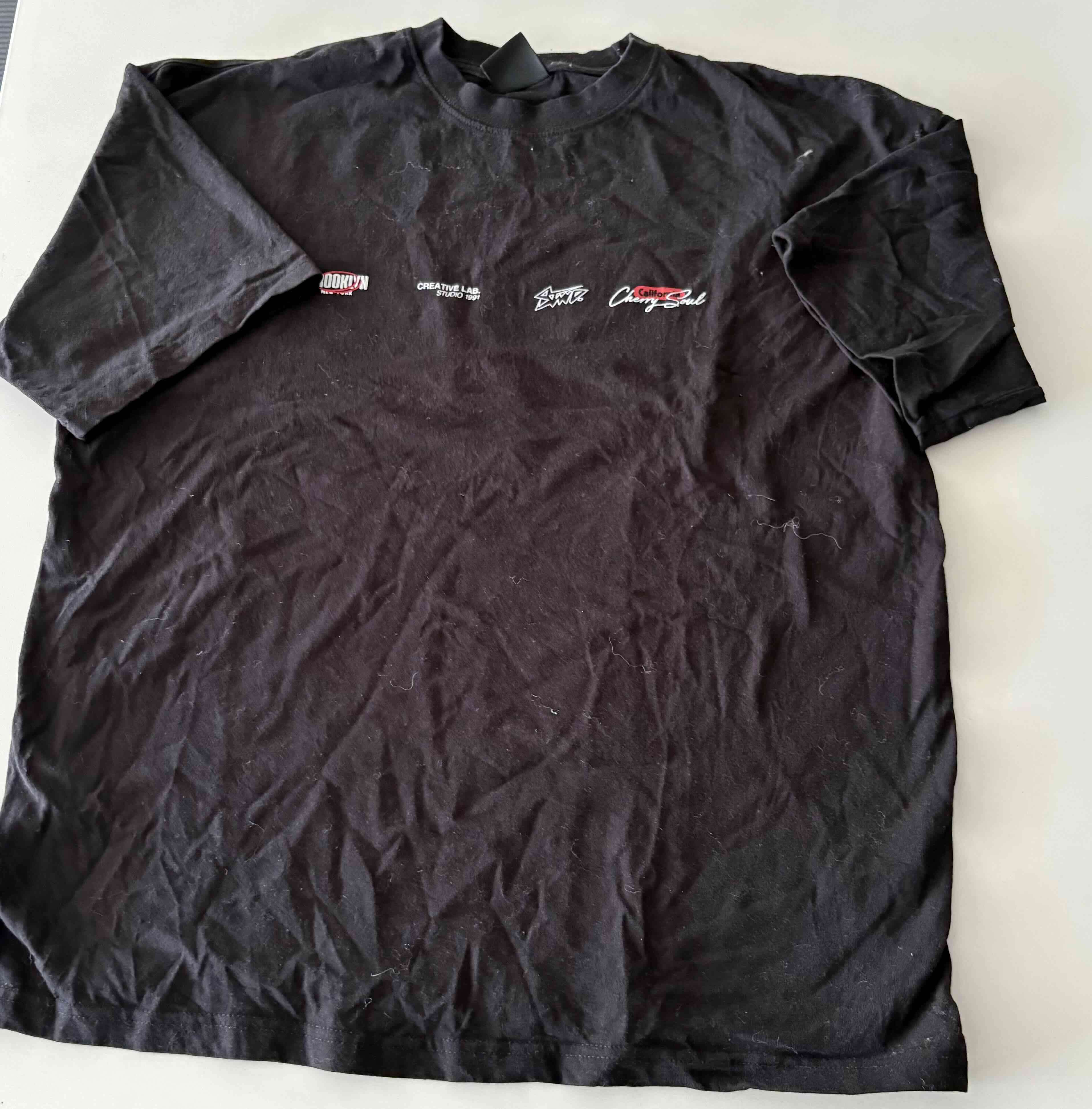 Polera negra decorativa - miniatura 1