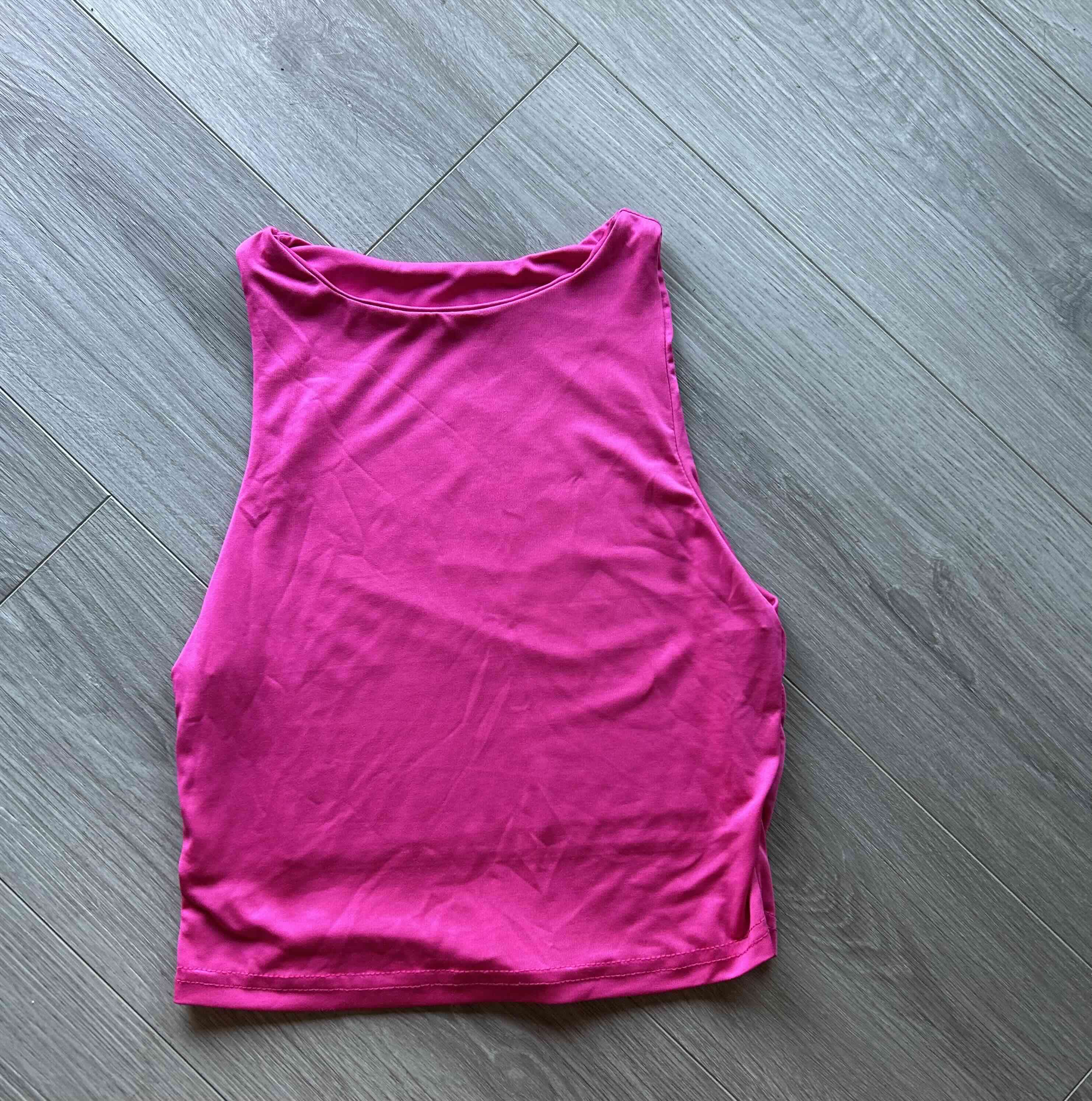 Polera fucsia sin mangas - miniatura 2