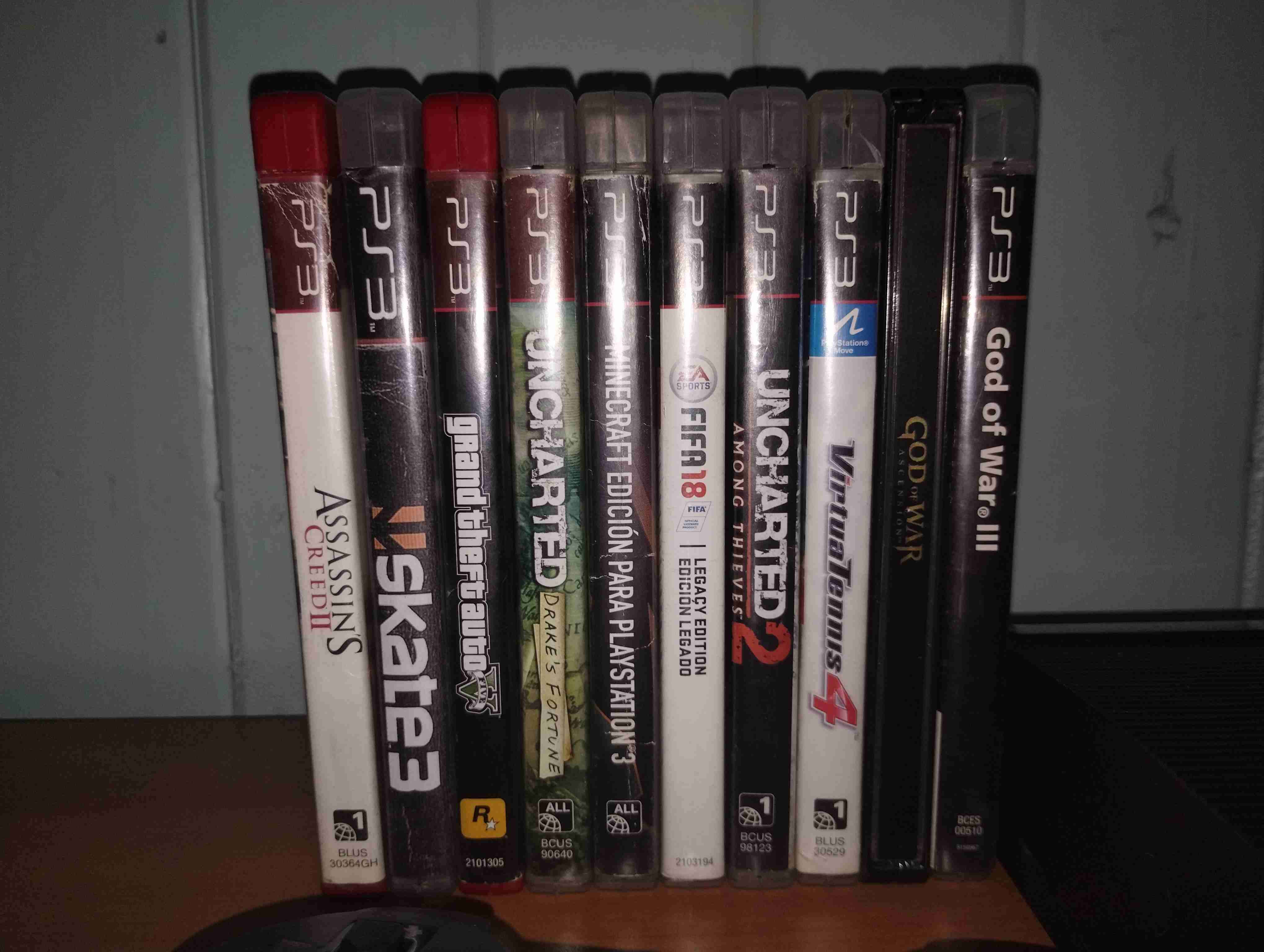 Consola PS3 con juegos y controles - miniatura 2