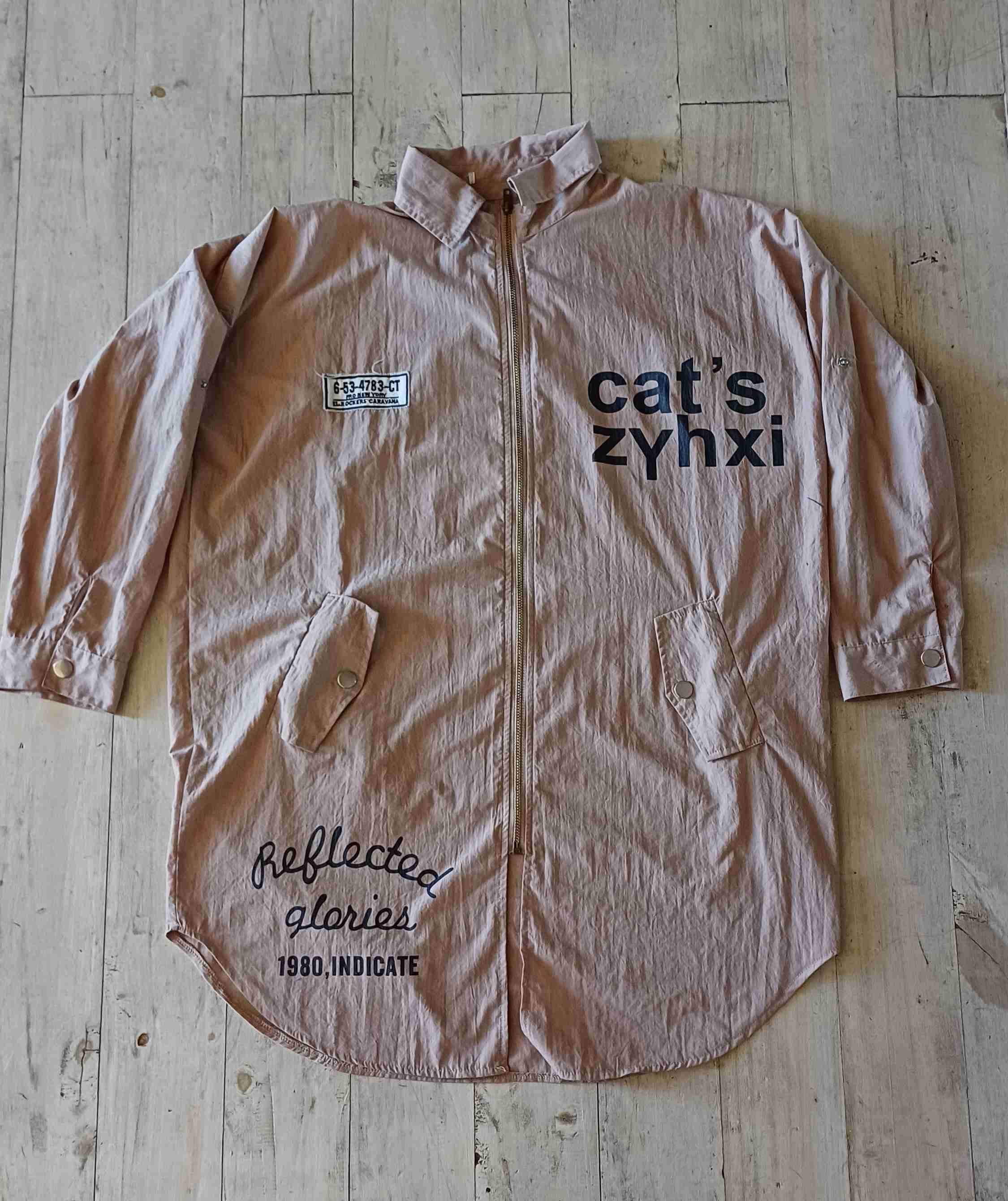 Chaqueta beige con estampado - 1