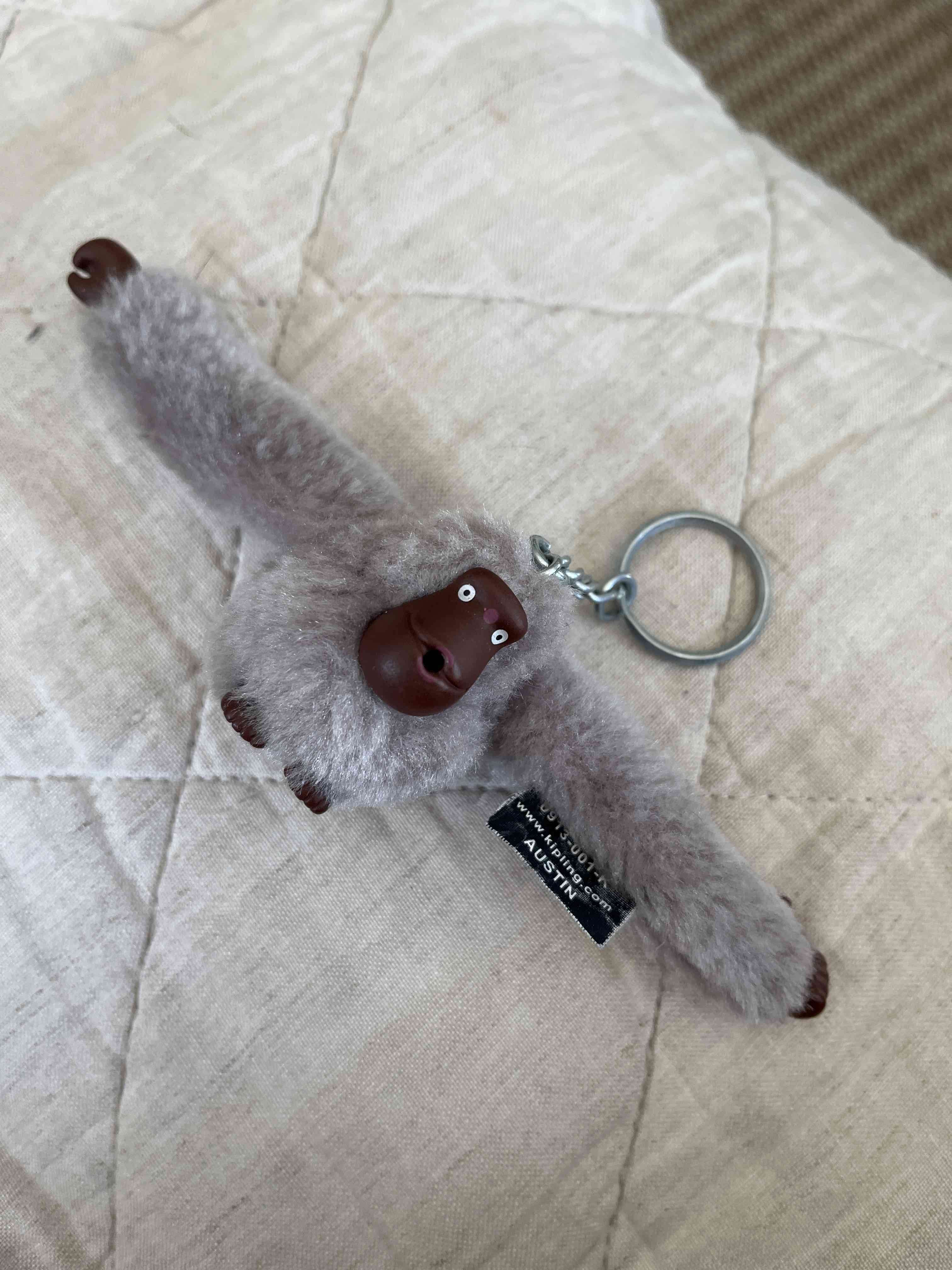 Llavero peluche mono gris - 1