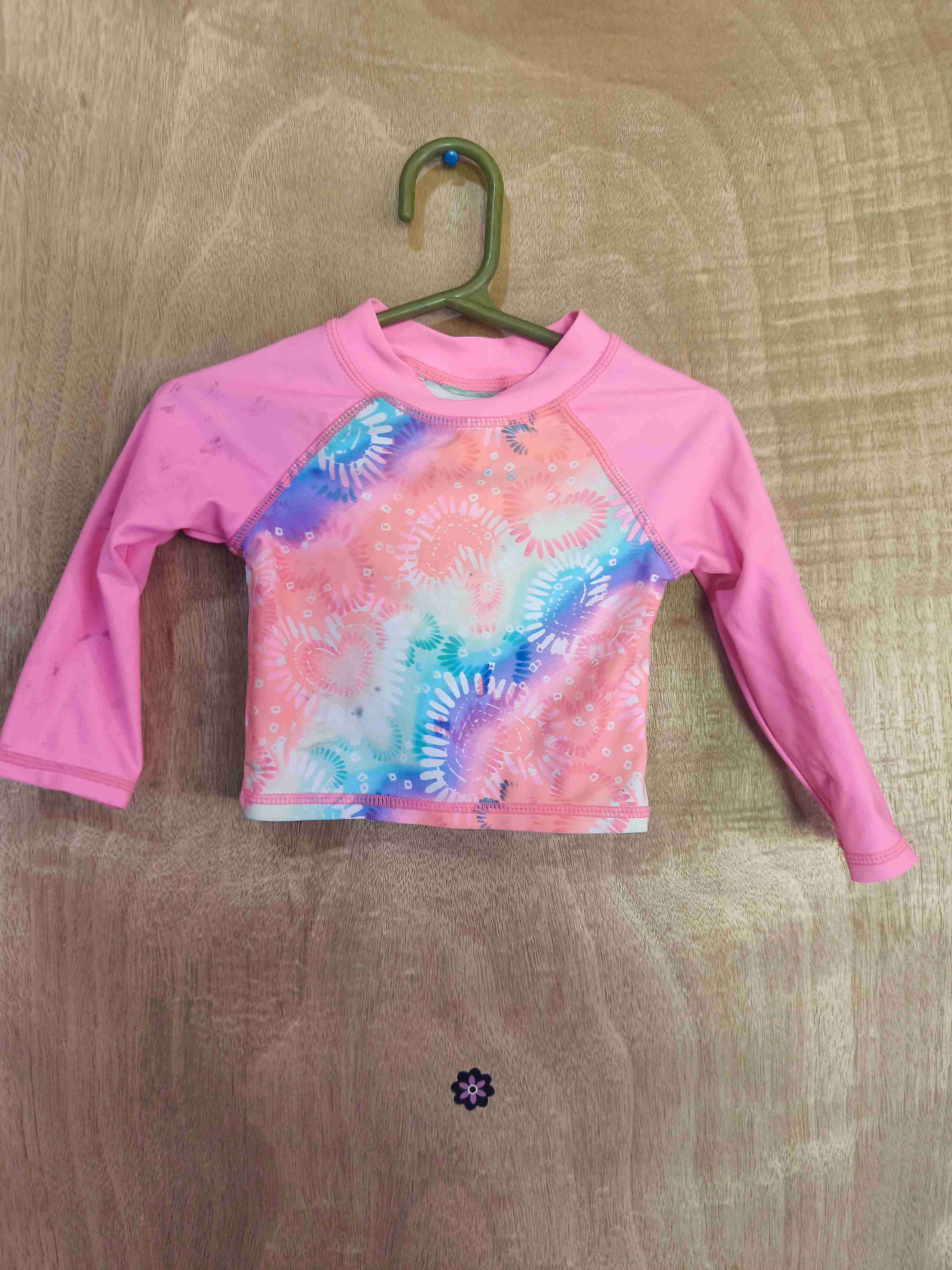 Polera traje de baño niña rosada con diseño