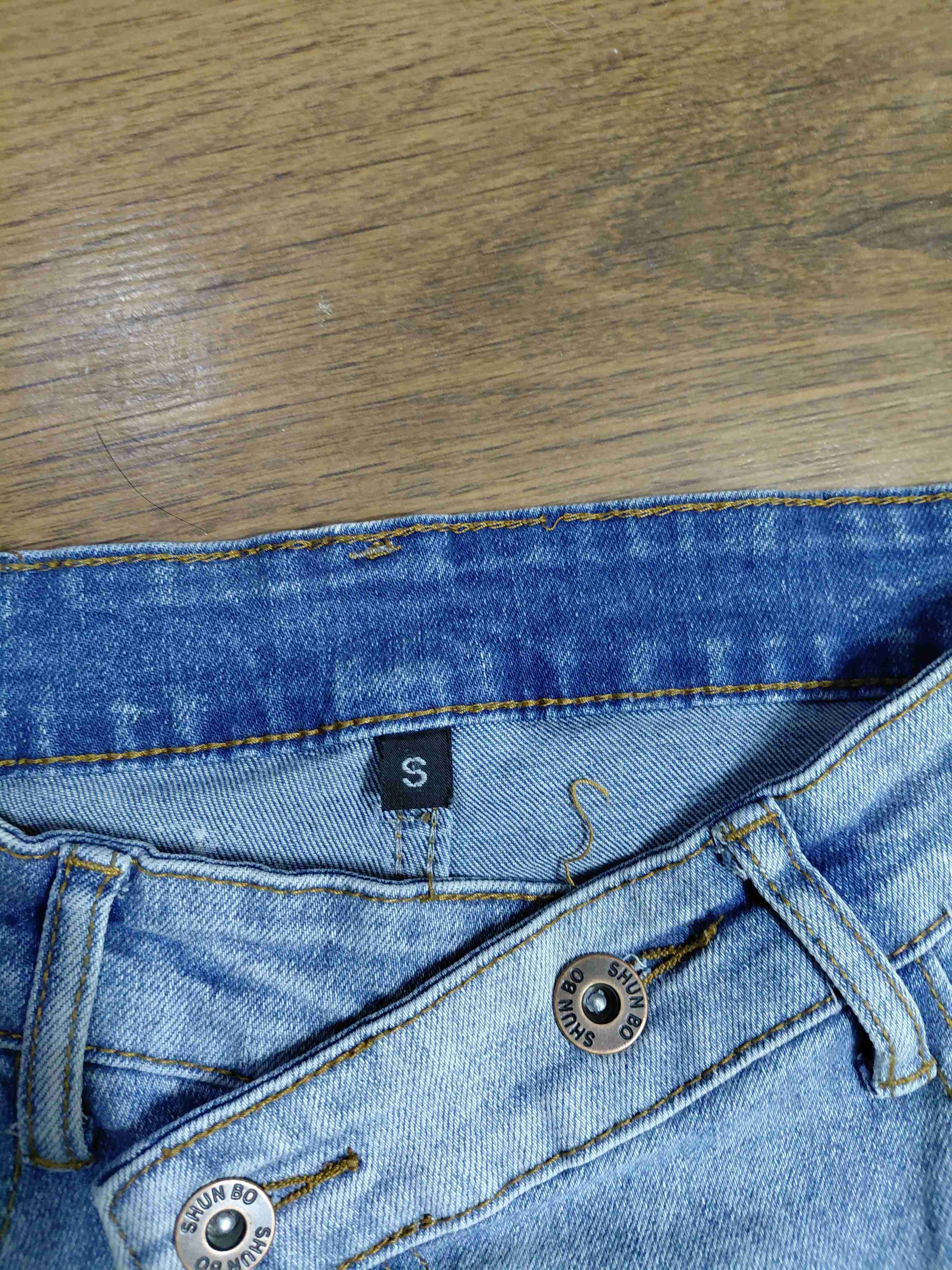 Jeans desgastados azul y gris - 4