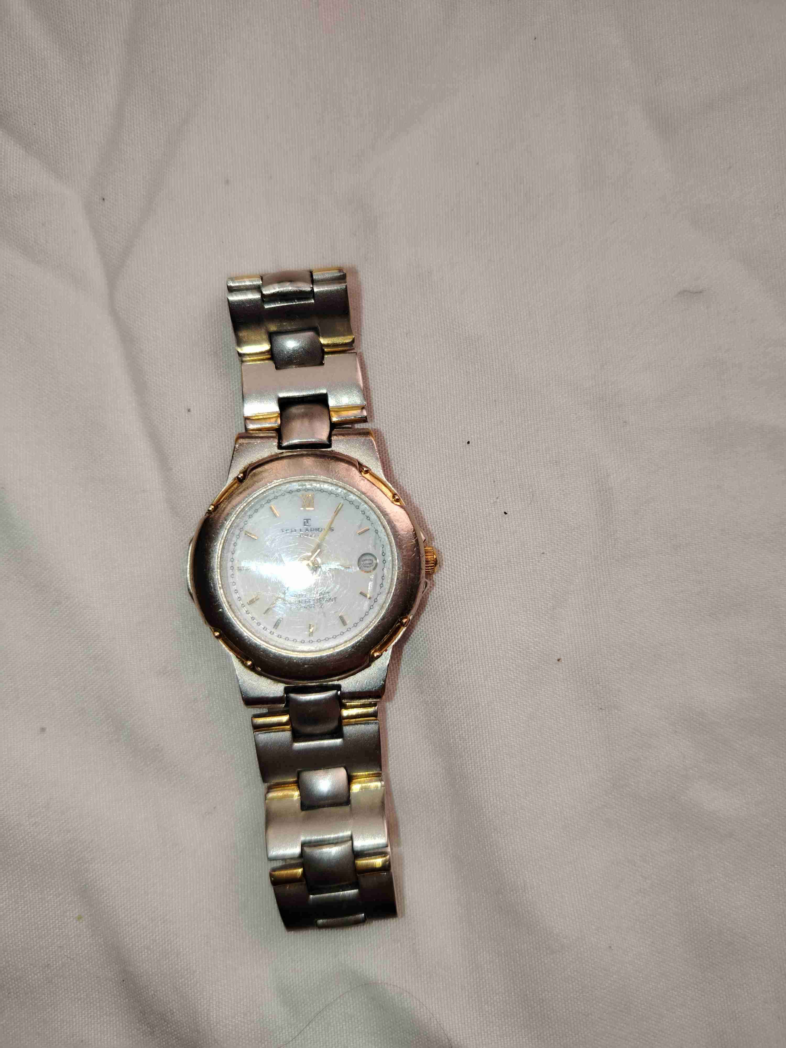 Reloj pulsera metálico bicolor marca telapidus