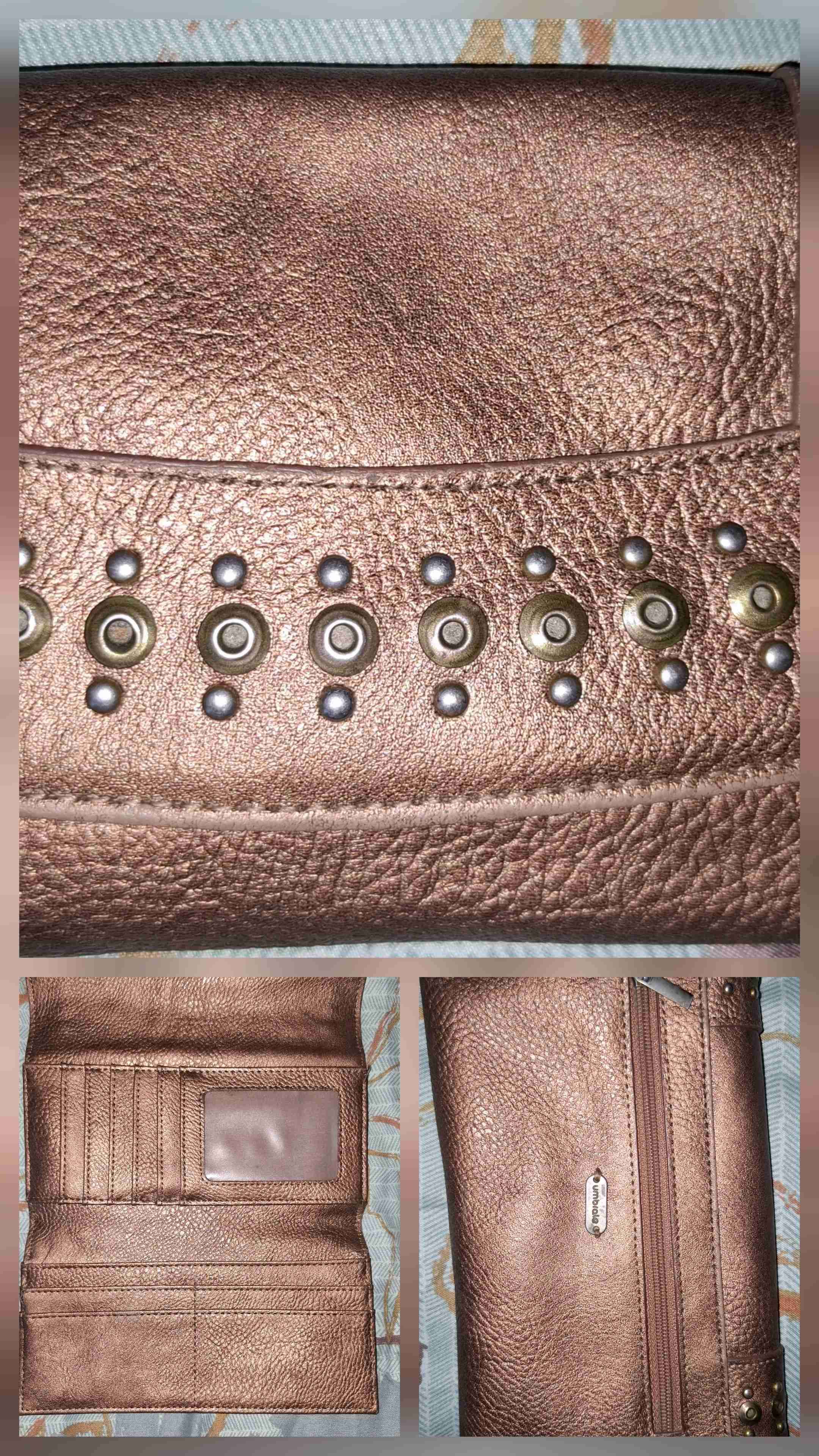 Billetera de cuero marrón con tachas