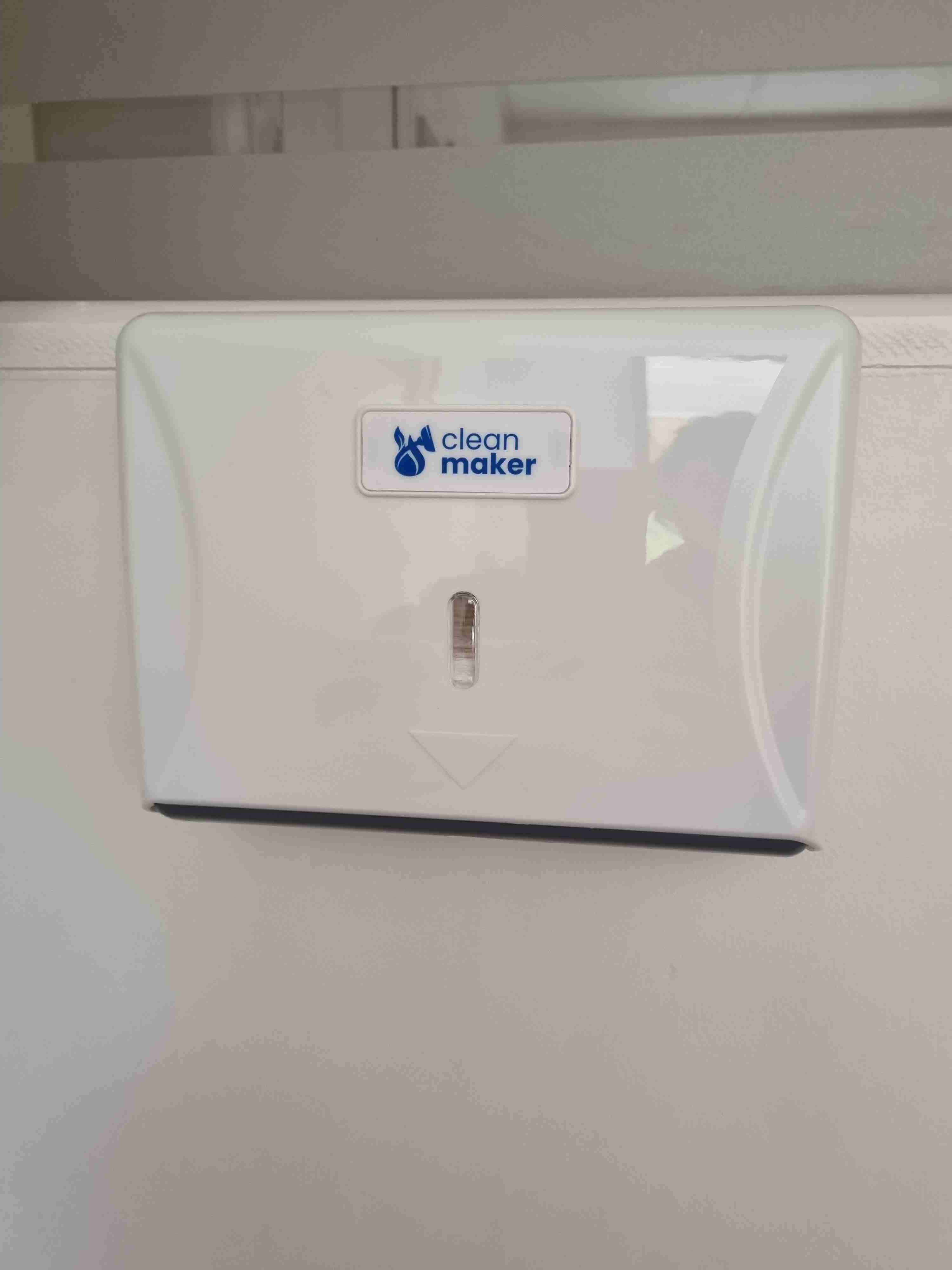 Dispensador de papel interfolado