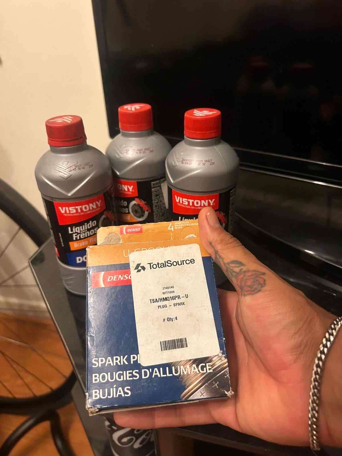 Líquido de frenos y bujías Denso