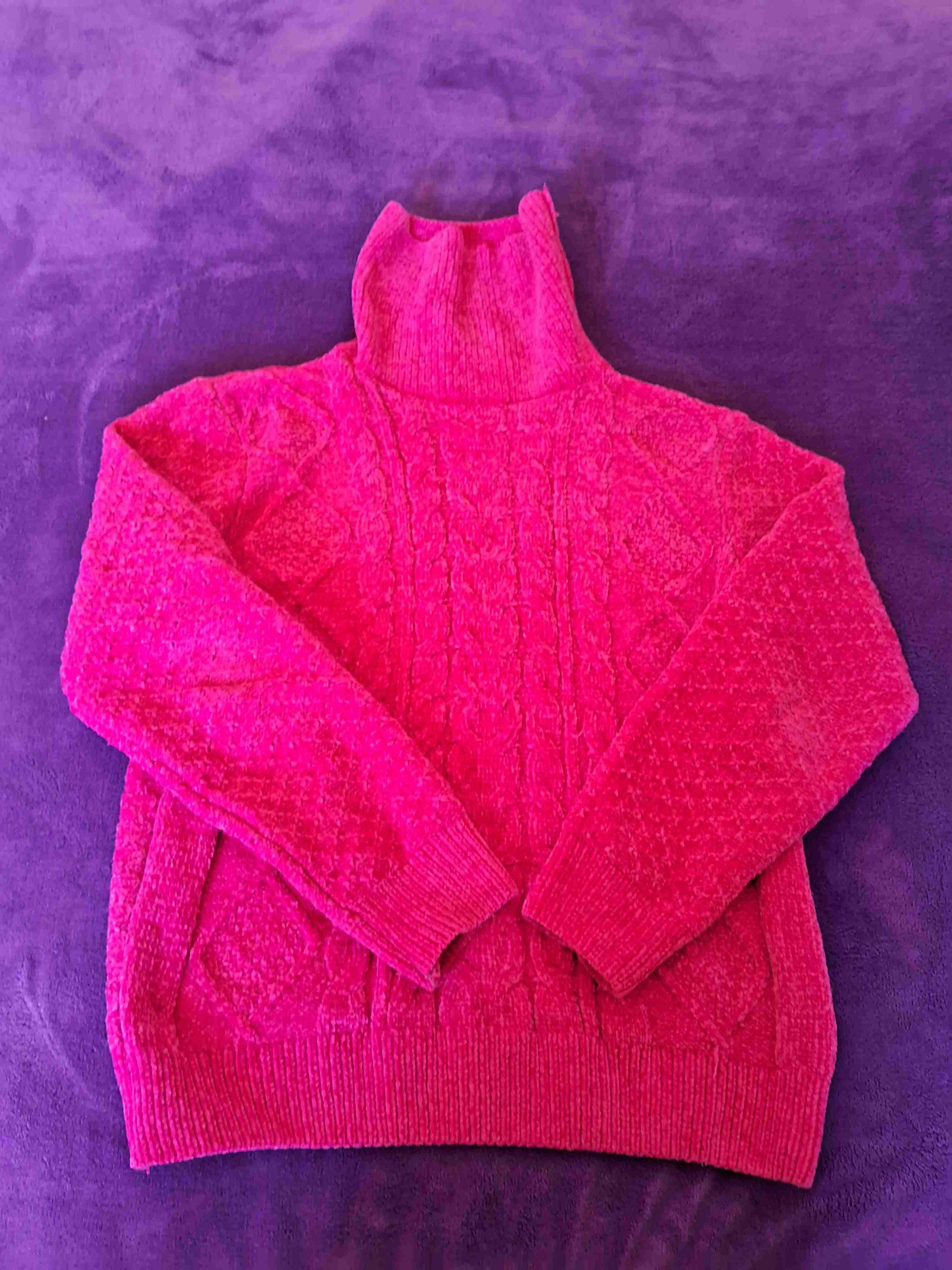 Suéter fucsia cuello alto