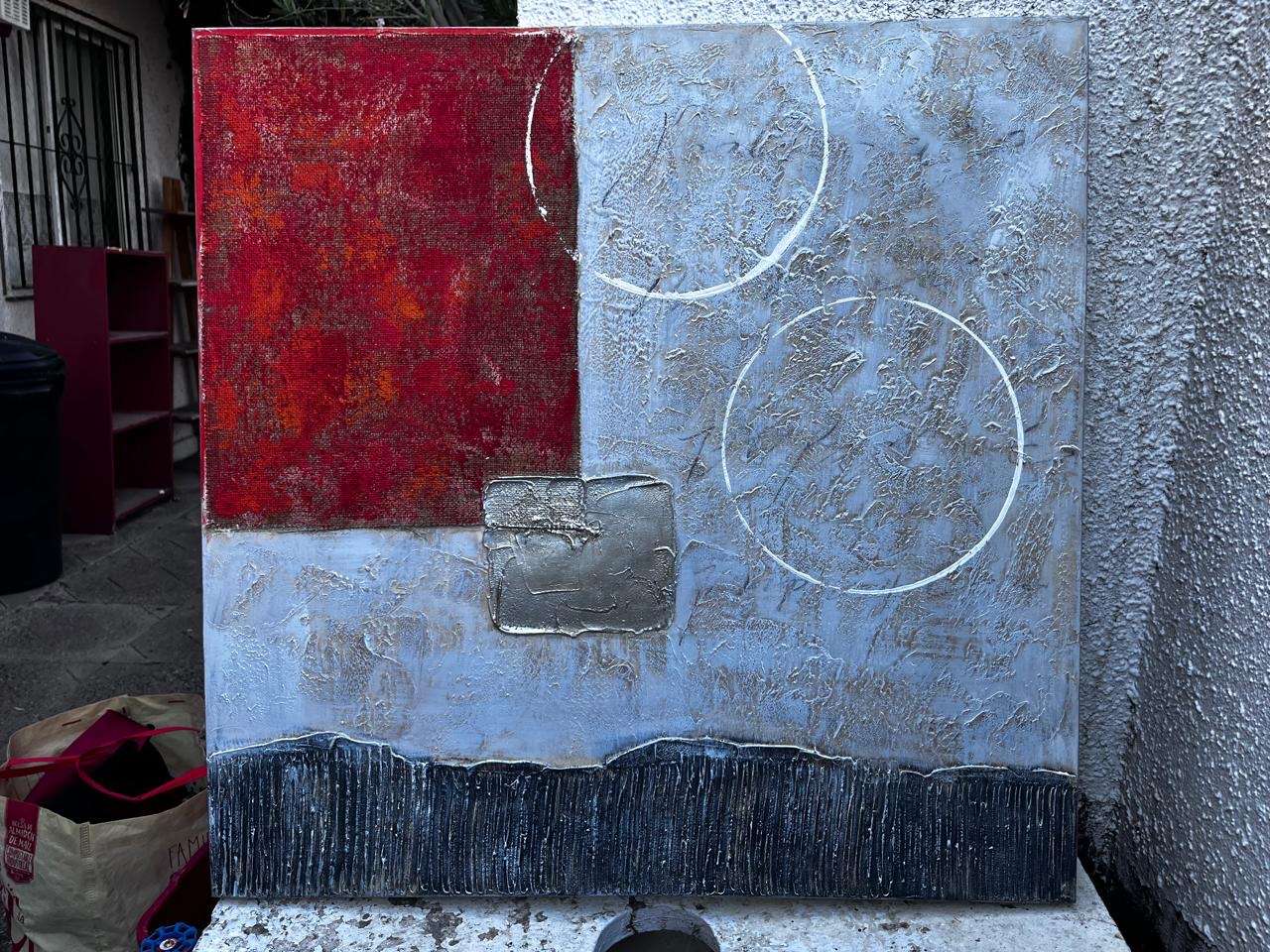 Cuadro abstracto en tonos rojos y grises