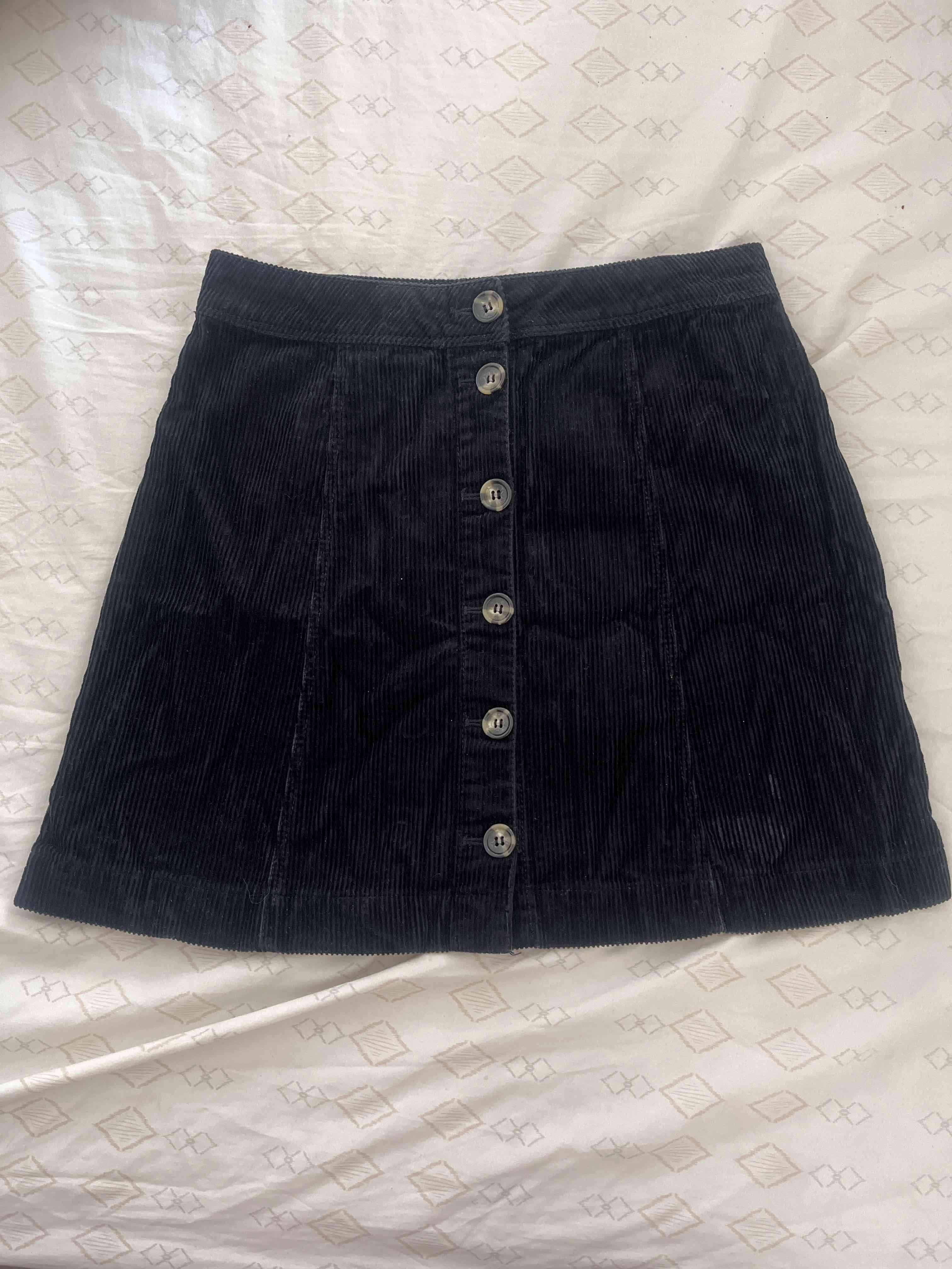 Falda de pana negra con botones - miniatura 1