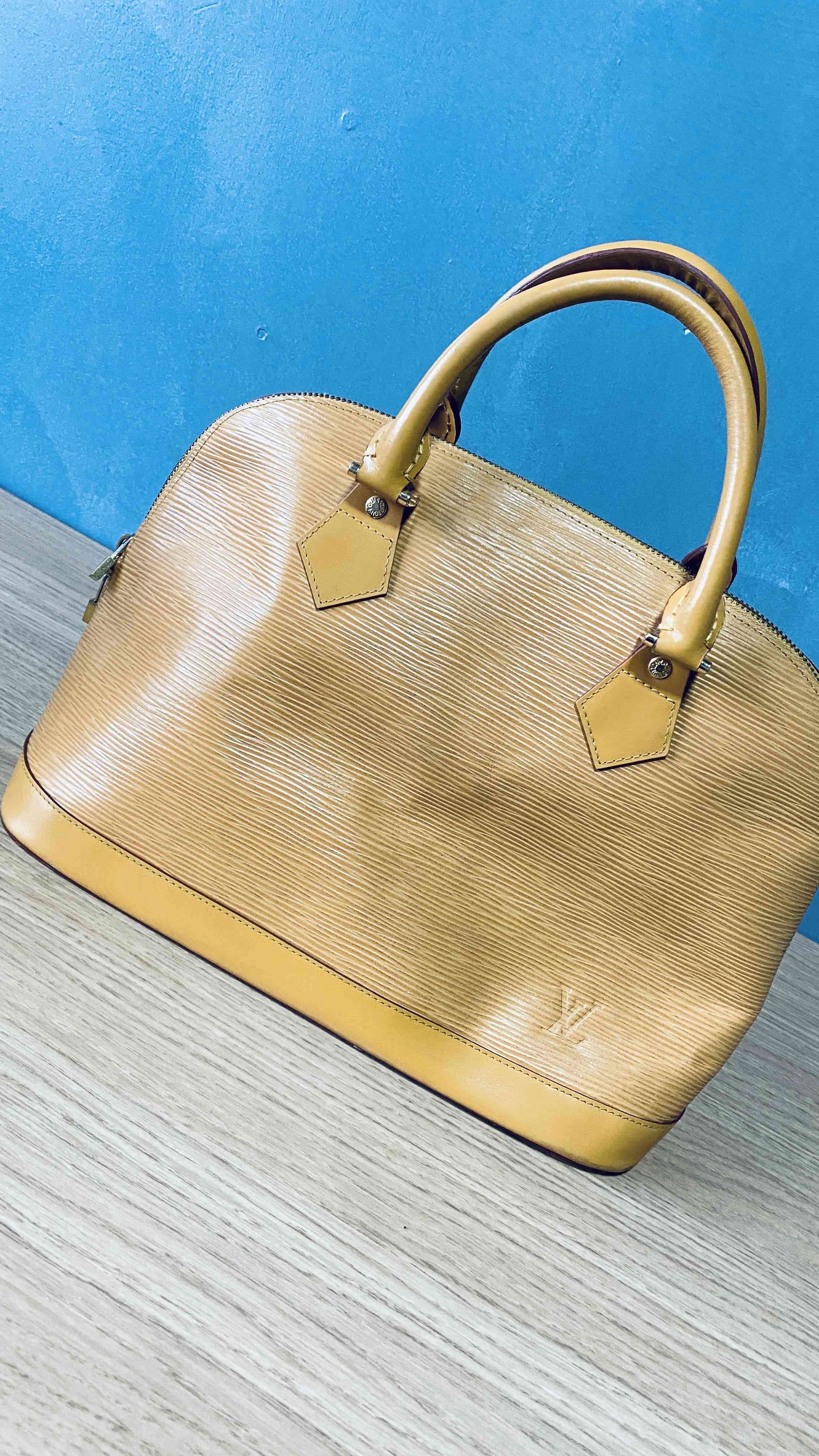 Cartera amarilla elegante louis vuitton - 1