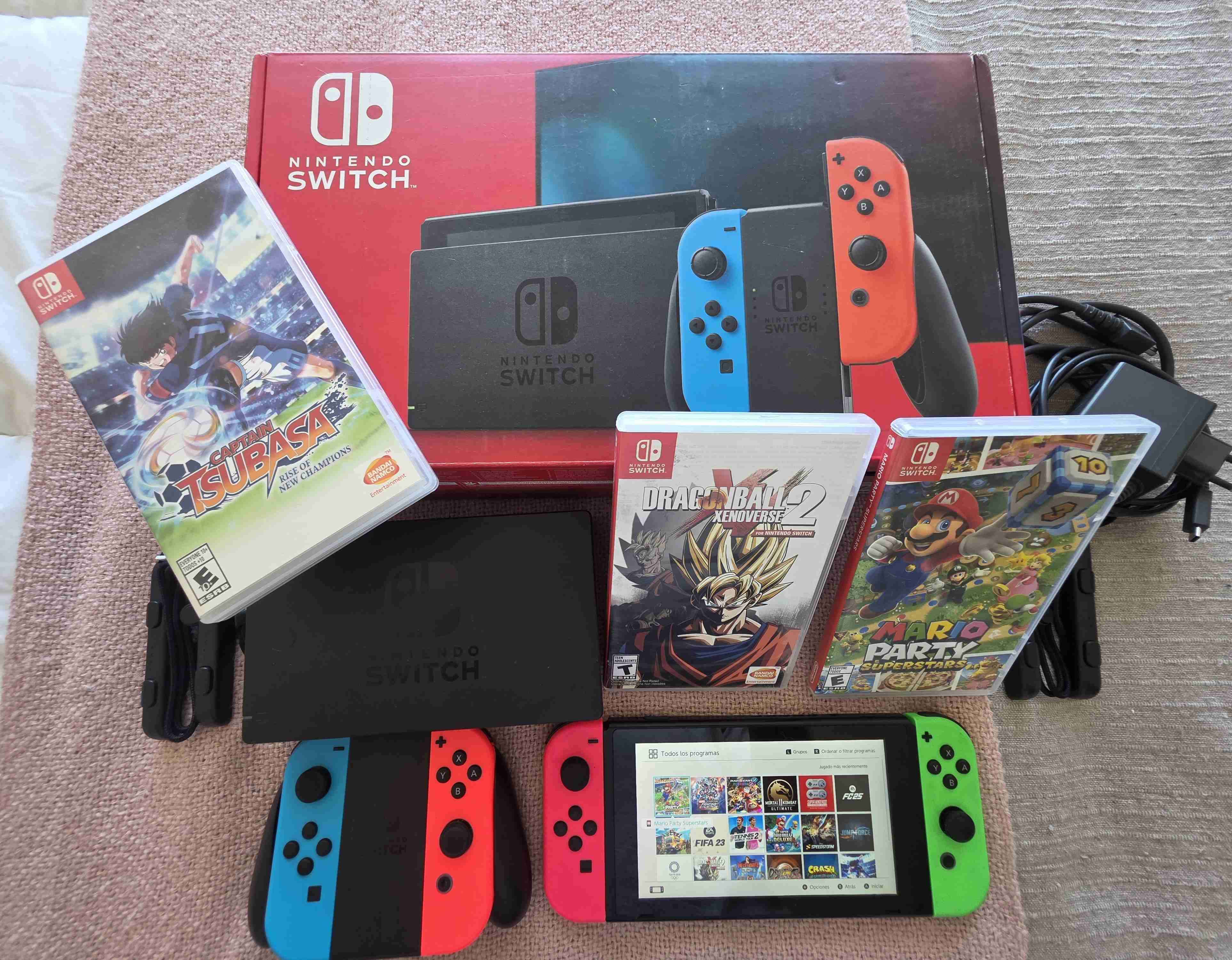 Nintendo Switch+ 4 controles + juegos. - miniatura 1