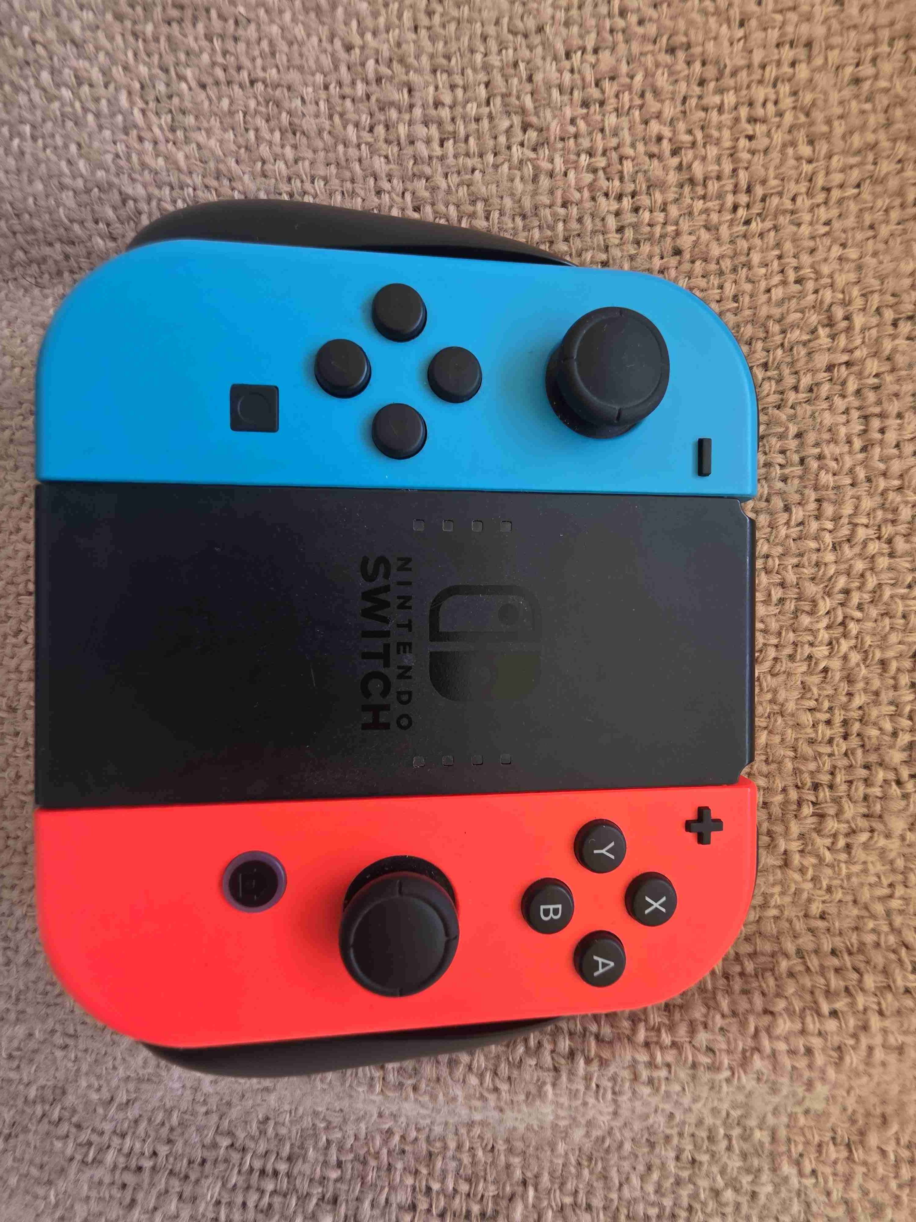 Nintendo Switch+ 4 controles + juegos. - miniatura 2