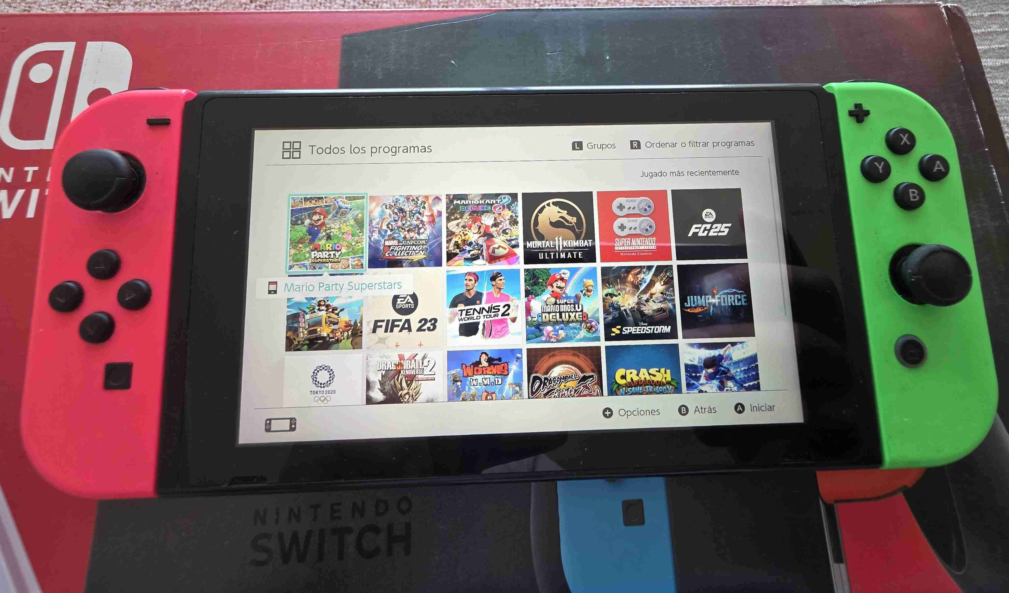 Nintendo Switch+ 4 controles + juegos. - miniatura 3