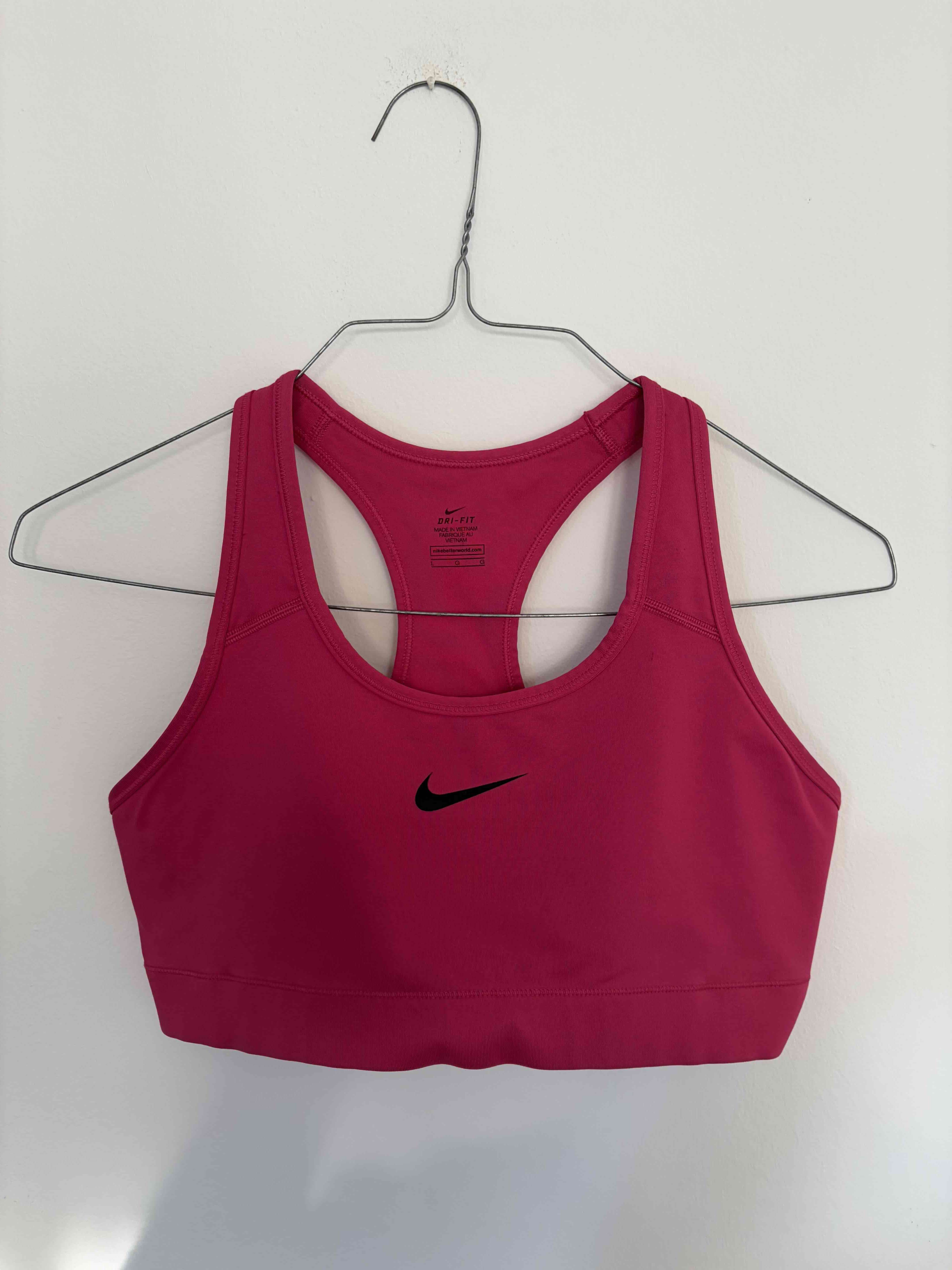 Top deportivo fucsia Nike - 1