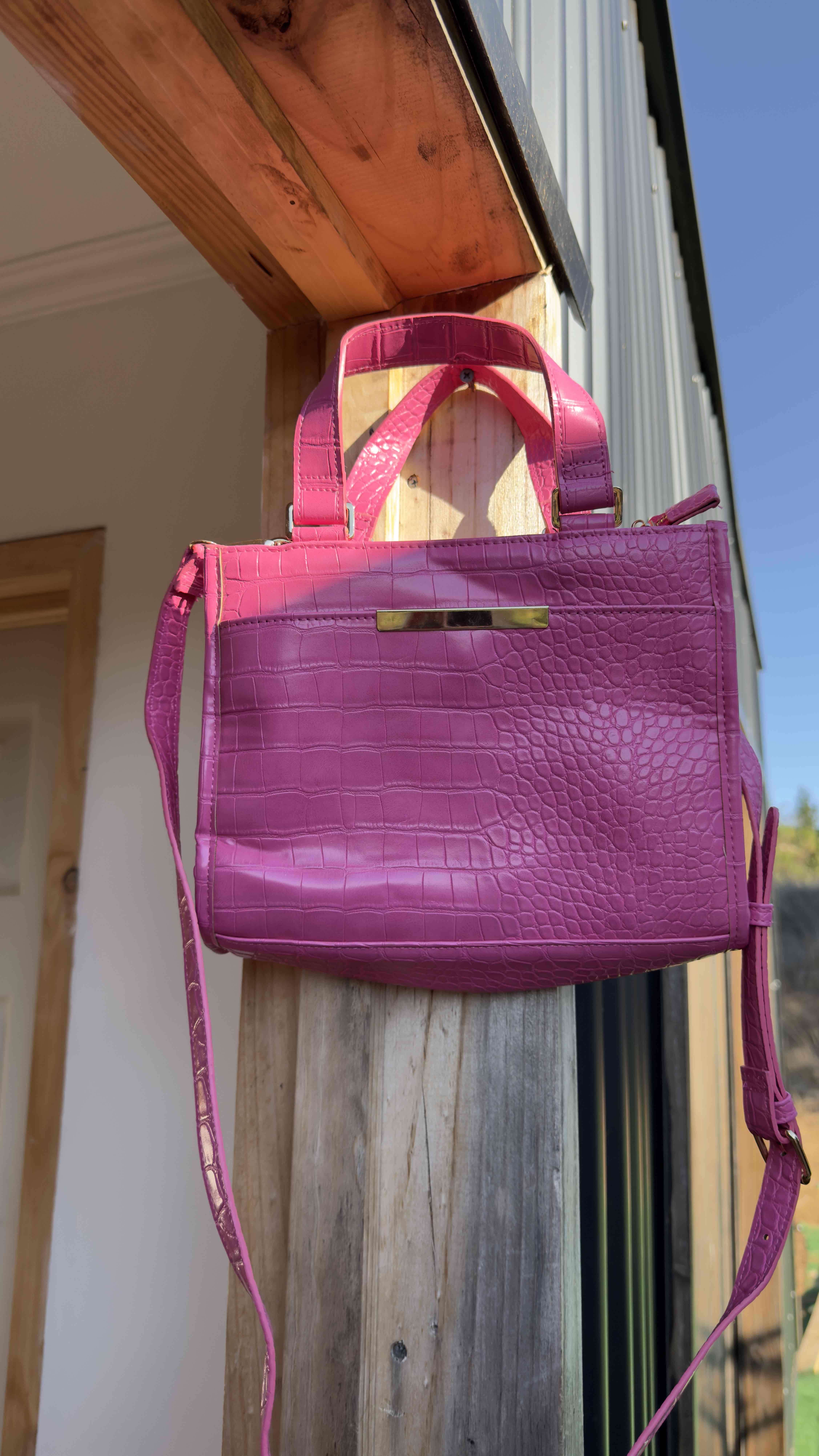 Cartera rosada de mujer - 4