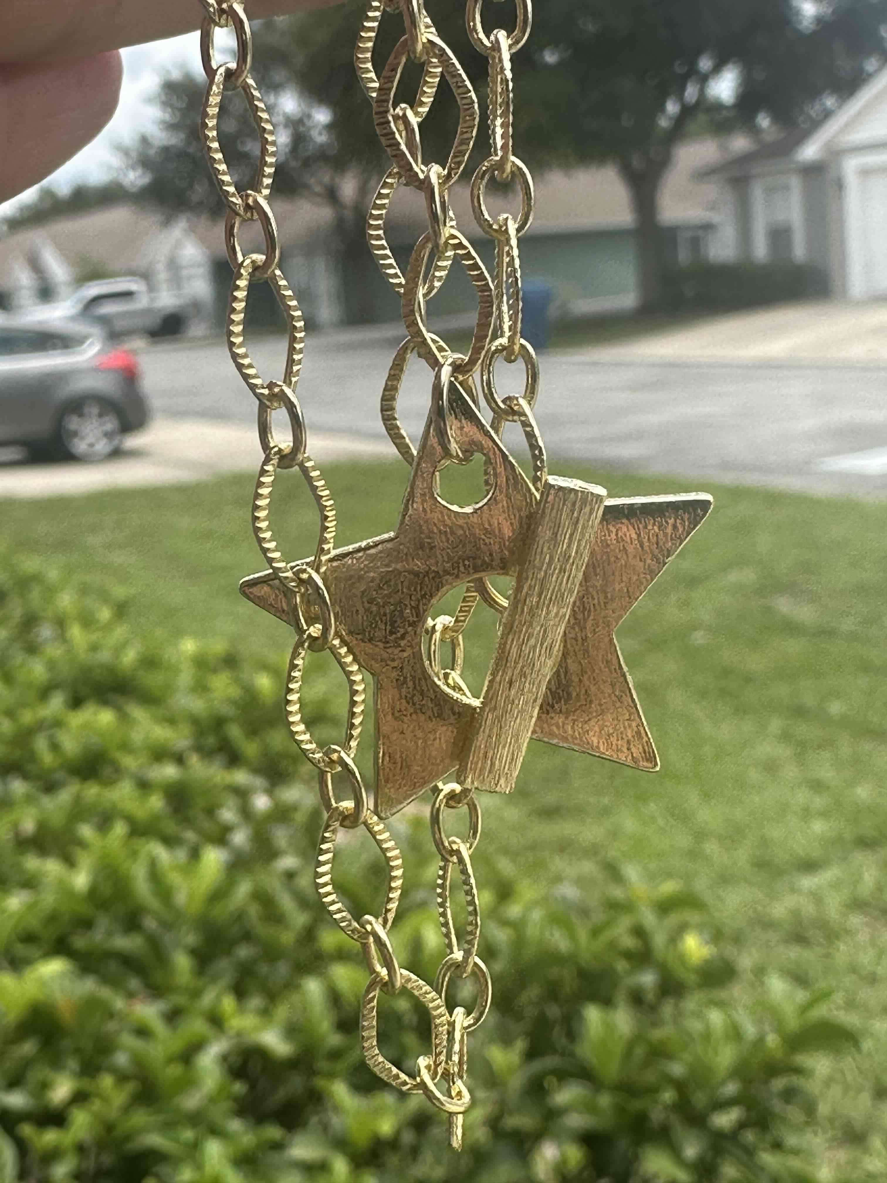 Collar dorado con colgante de estrella - miniatura 3