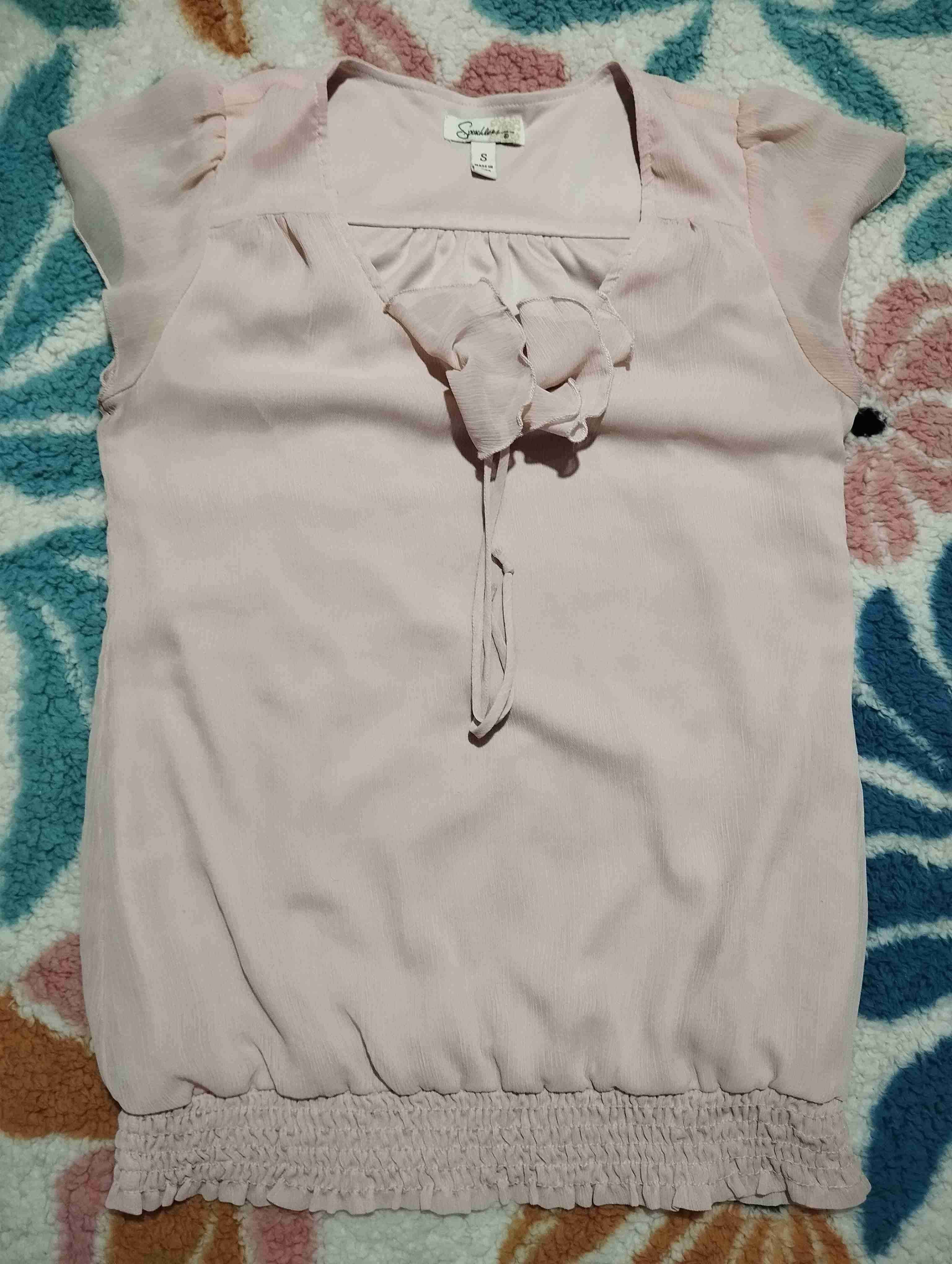 Blusa rosa sin mangas - miniatura 1
