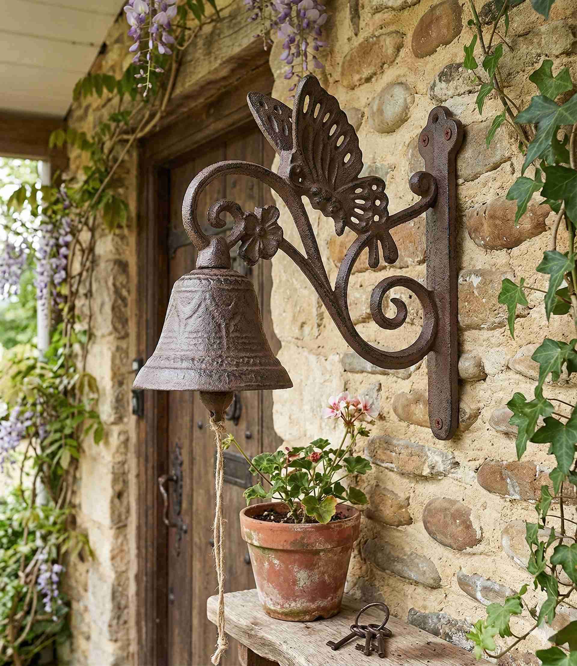 Campana de hierro fundido con figuras - miniatura 3