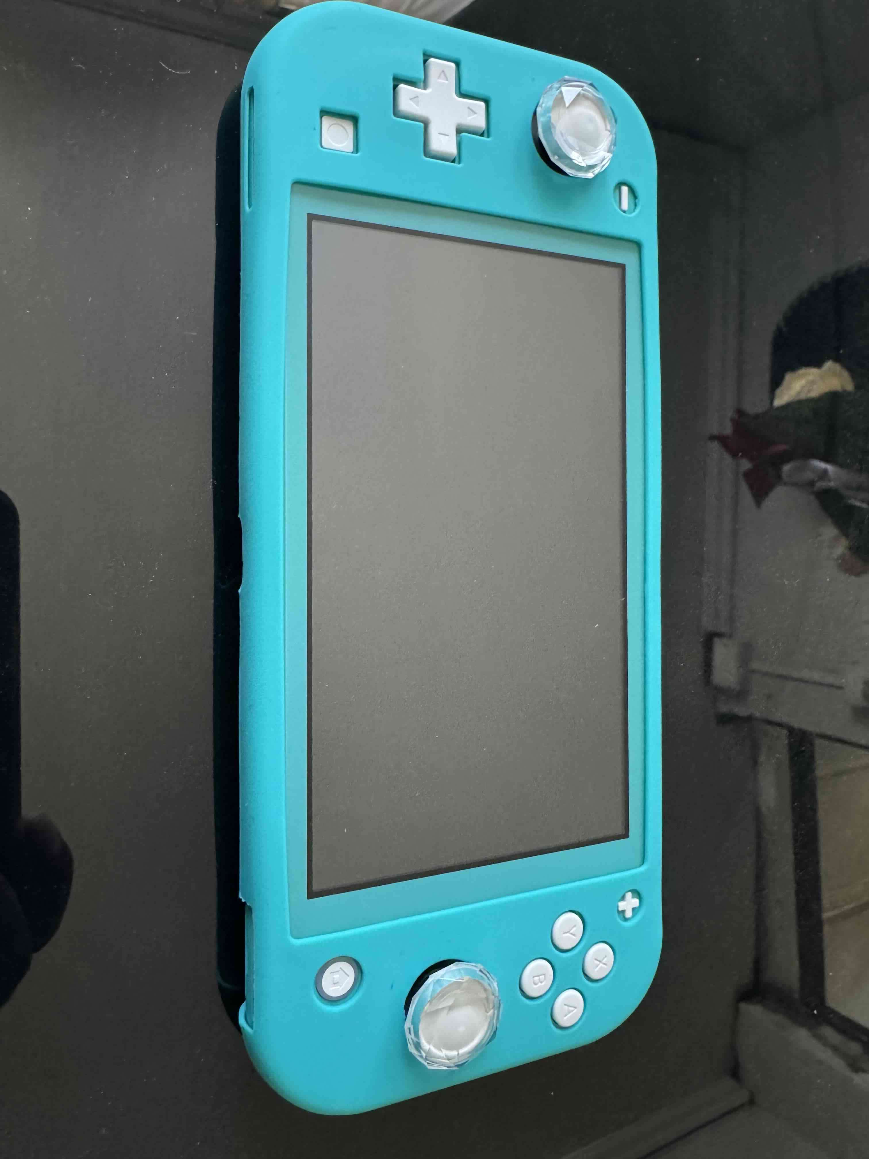 Consola portátil azul con funda - miniatura 1