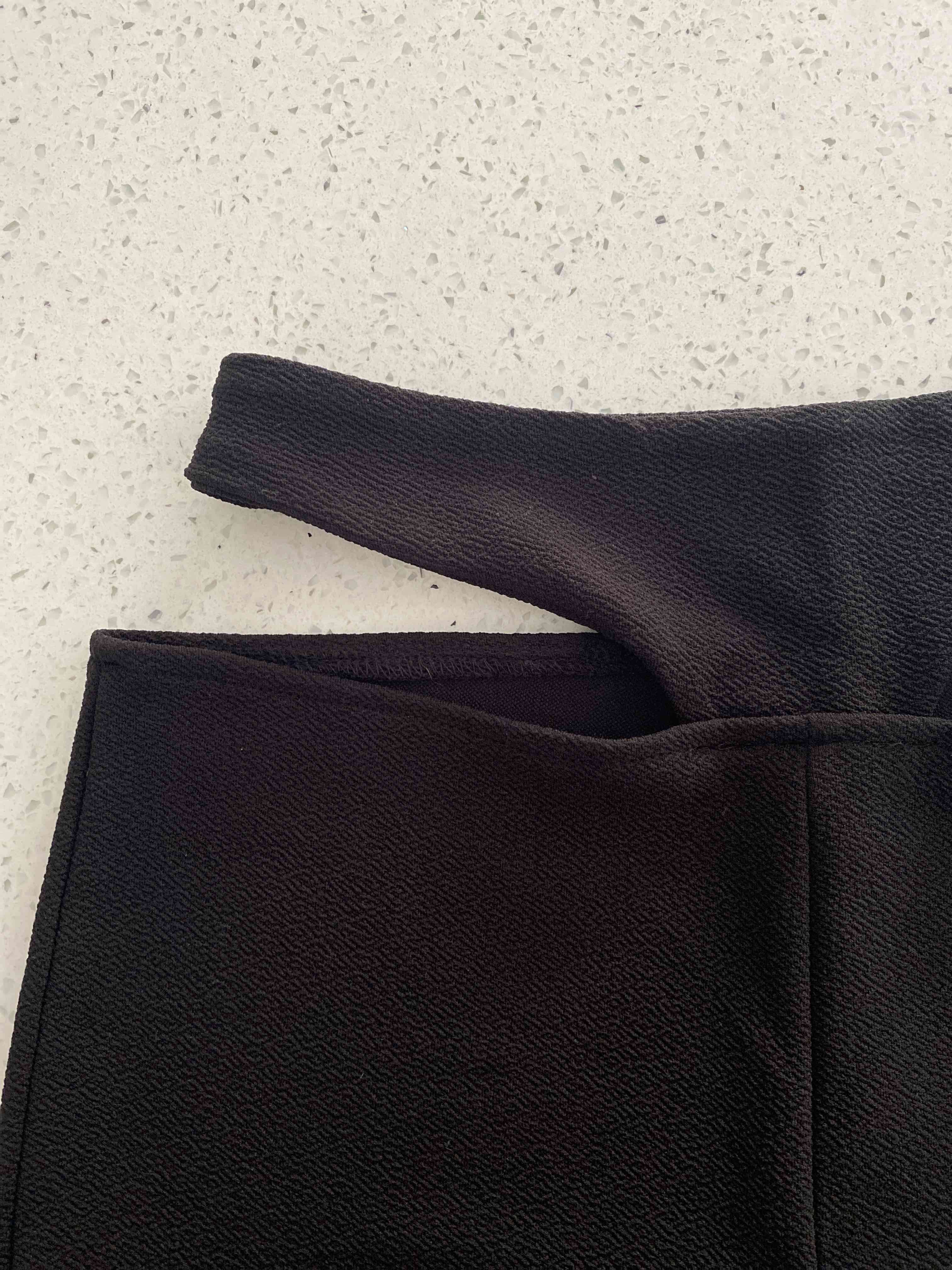 Pantalones negros acampanados - miniatura 2